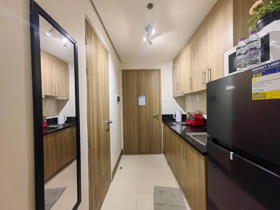 1BR Condotel with Balcony at FAME Residences #FM47 view 4