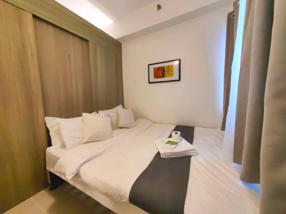1BR Condotel with Balcony at FAME Residences #FM53 view 2