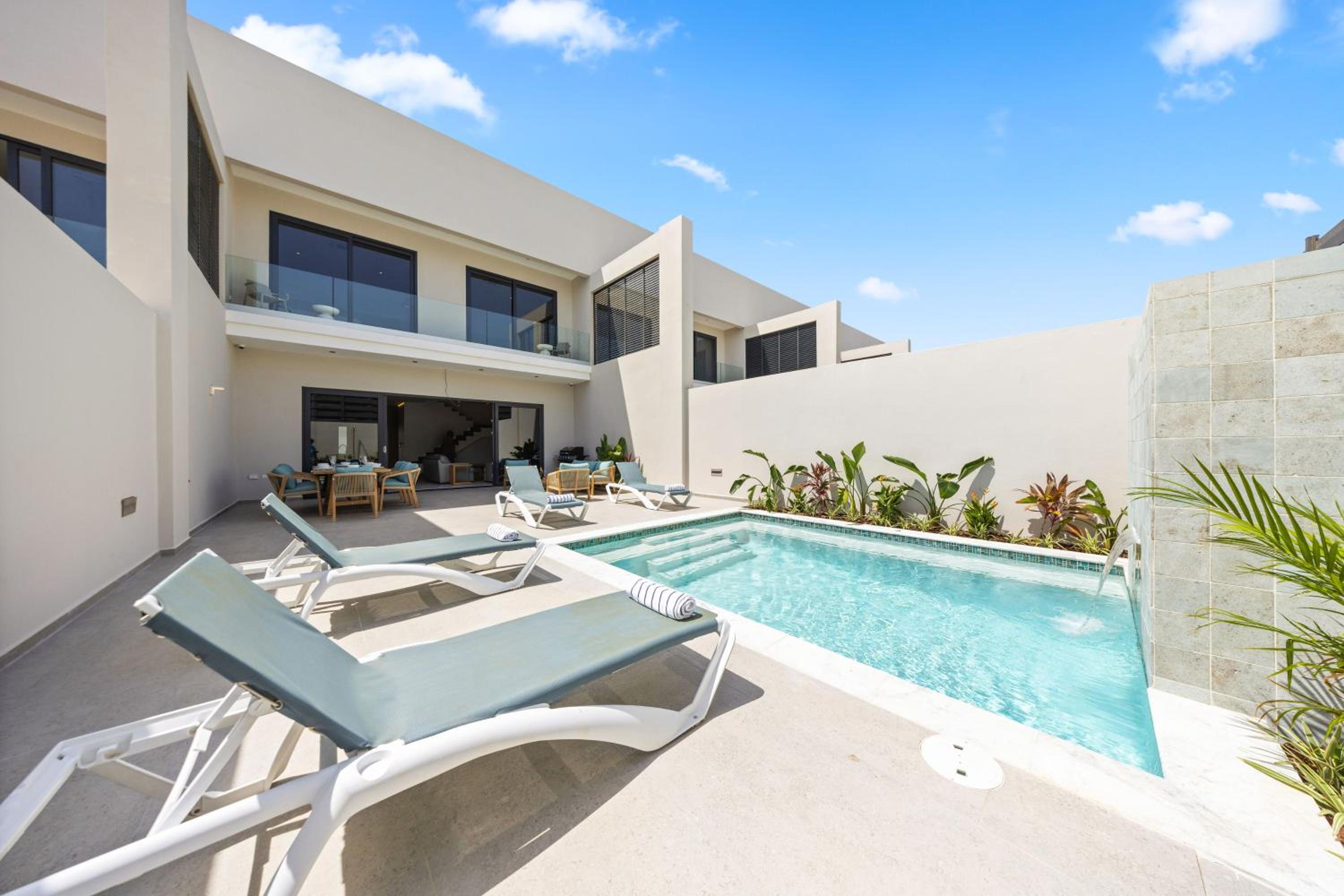 Boca Catalina 5 NEW 4BR 4BA Pool Walk to Beach by Bocobay