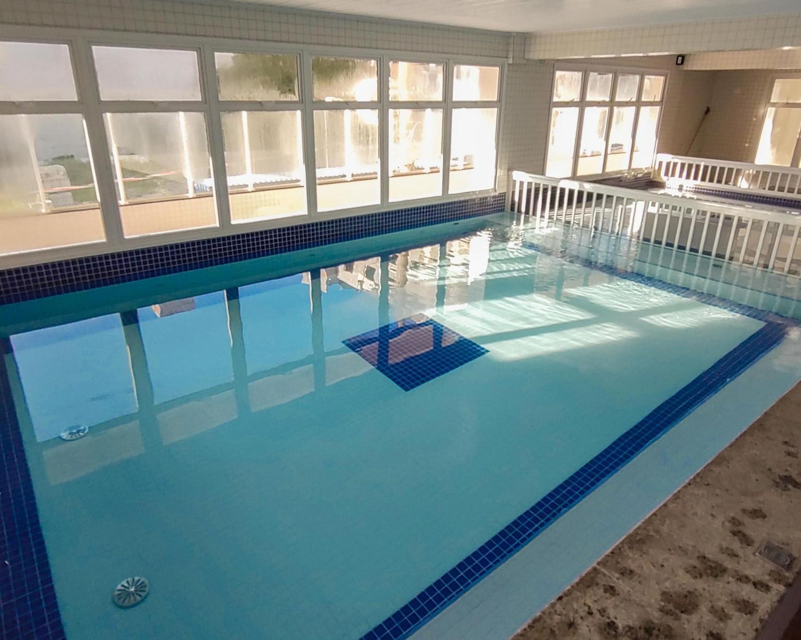 Apartamentos a 100m Praia das Toninhas PISCINA AQUECIDA