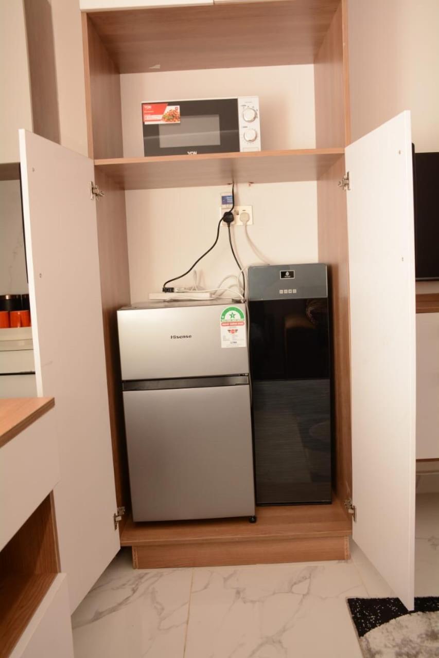 Cozy partitioned studio in Smarthomes Serviced Apartment-Kilimani
