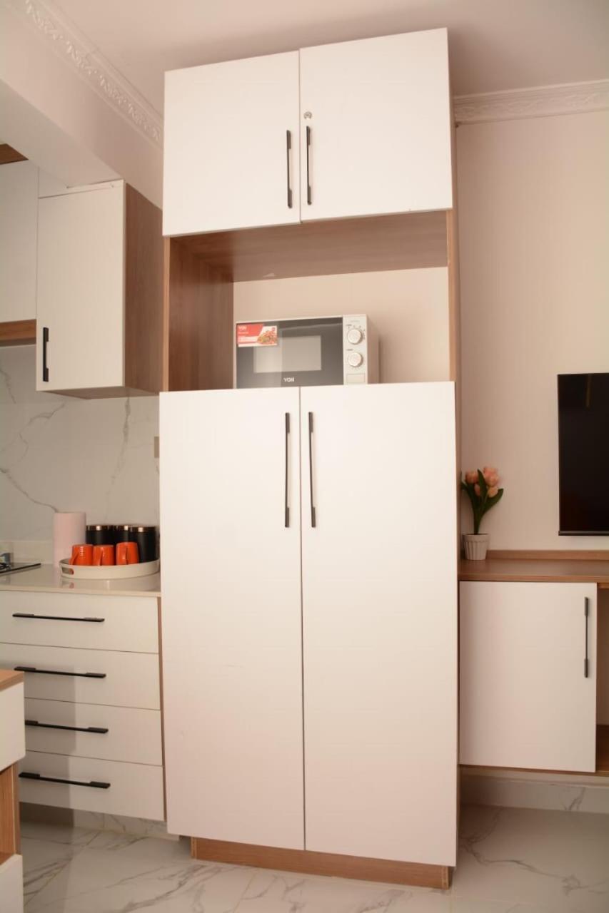 Cozy partitioned studio in Smarthomes Serviced Apartment-Kilimani