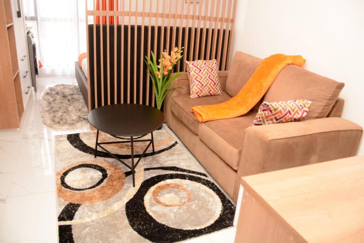 Cozy partitioned studio in Smarthomes Serviced Apartment-Kilimani
