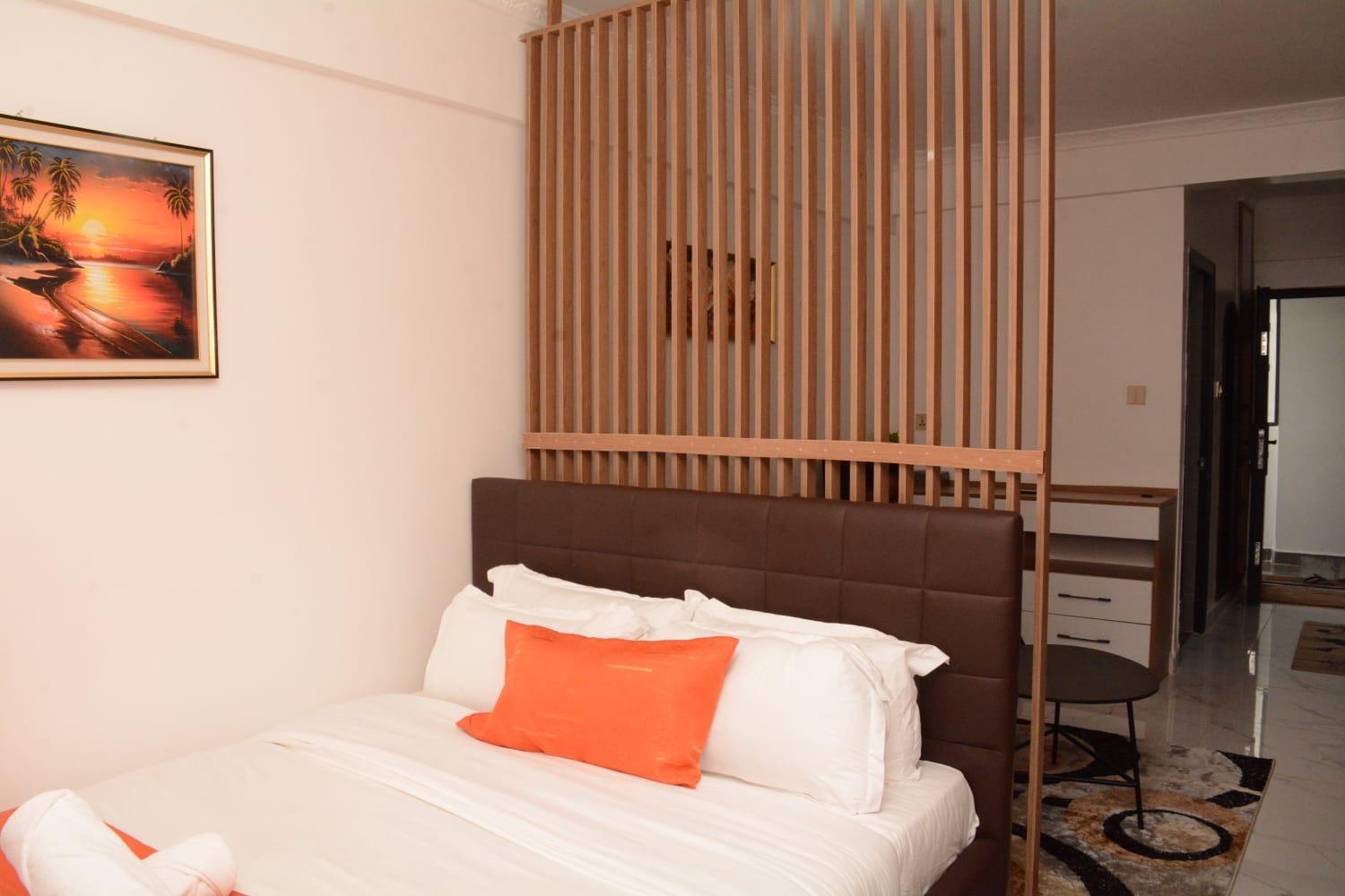 Cozy partitioned studio in Smarthomes Serviced Apartment-Kilimani