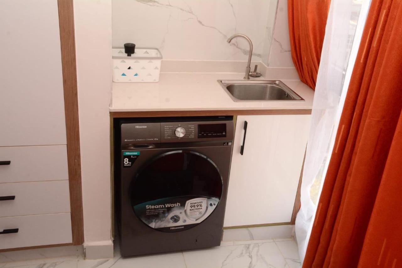 Cozy partitioned studio in Smarthomes Serviced Apartment-Kilimani
