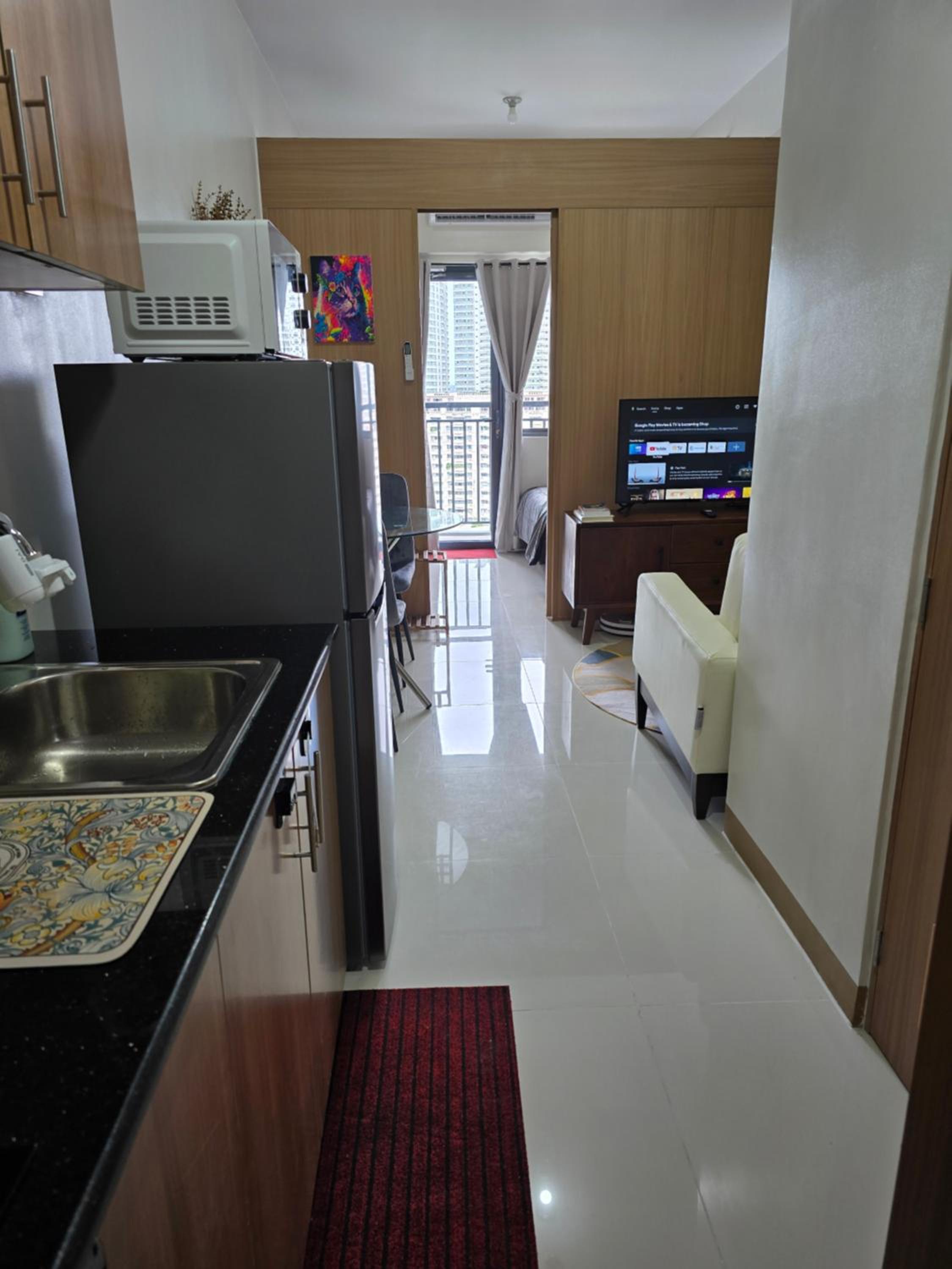 Red Residence Central Makati with pay parking view 4