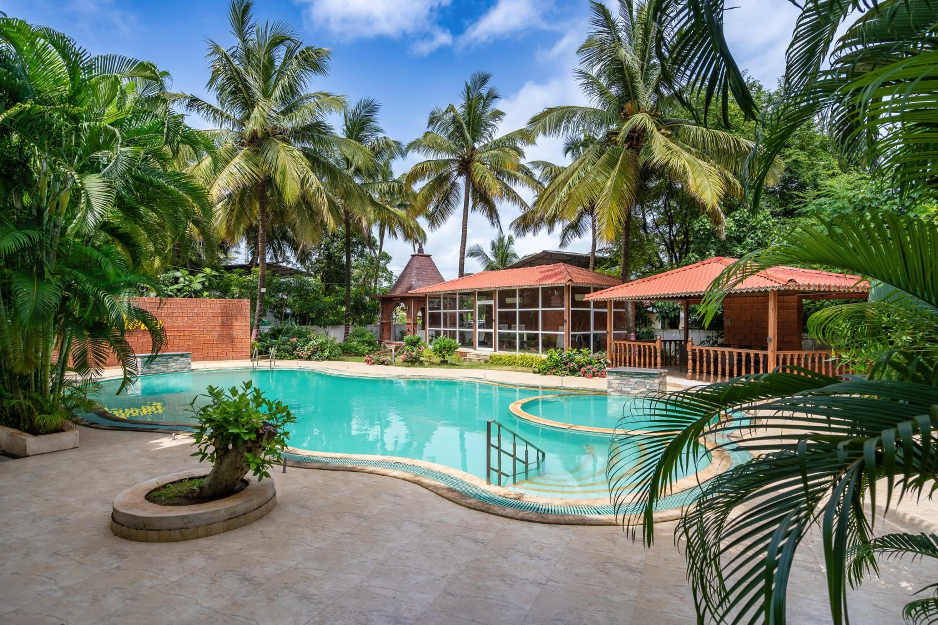 SaffronStays Euphoria Shores - 6BR villa with bar counter, pool & lawns 400m from Kihim Beach in Alibaug