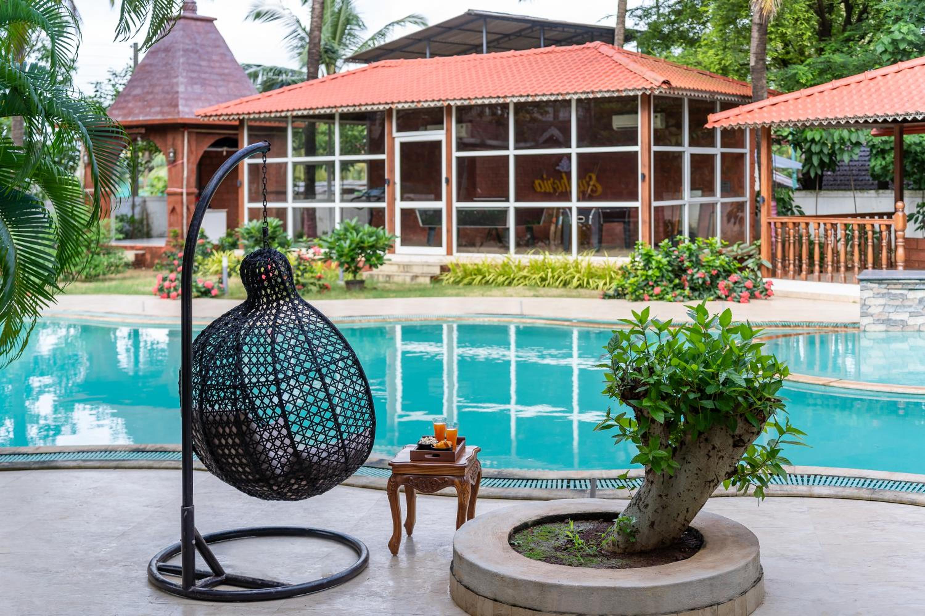 SaffronStays Euphoria Shores - 6BR villa with bar counter, pool & lawns 400m from Kihim Beach in Alibaug