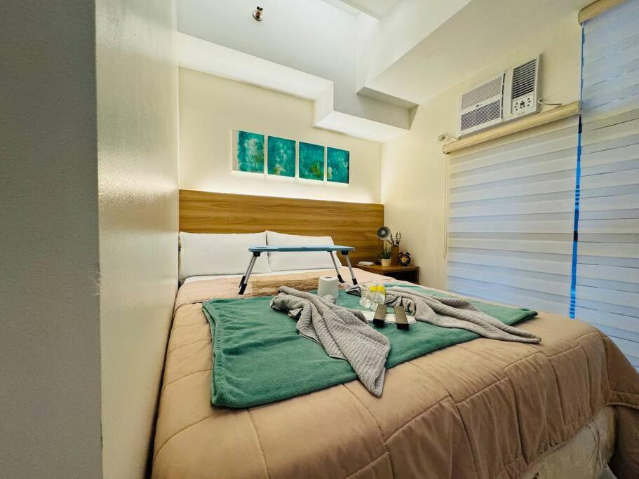 Staycation in Mckinley walking distance to Venice Mall view 2