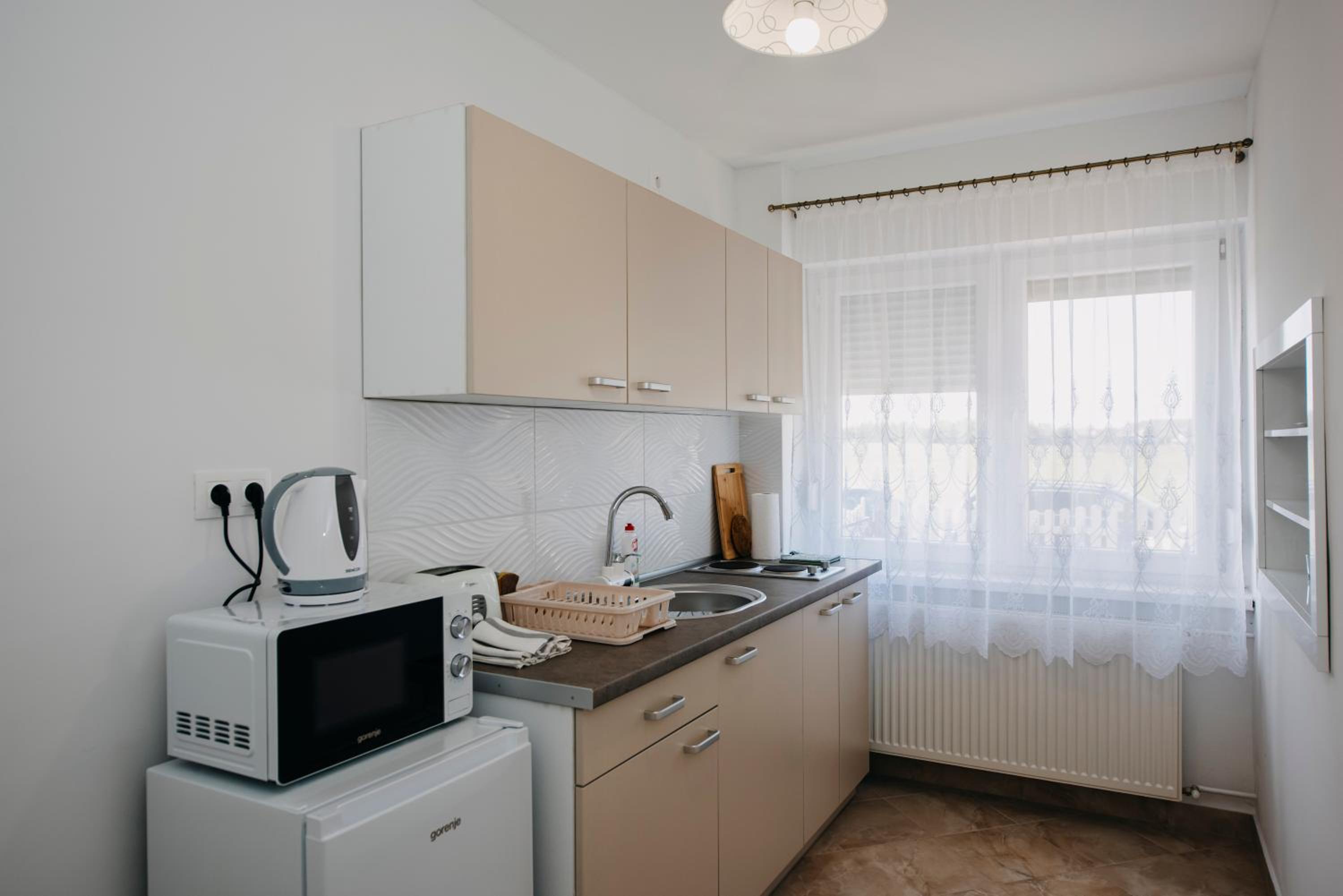 Nyugalom Szigete Apartmanok