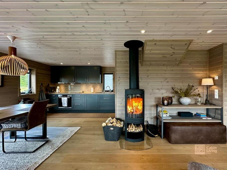 High standard cabin at Sjusjøen sauna, hot tub & ski trails right outside view 3