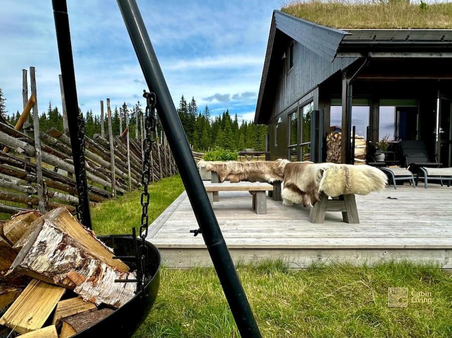 High standard cabin at Sjusjøen sauna, hot tub & ski trails right outside view 5