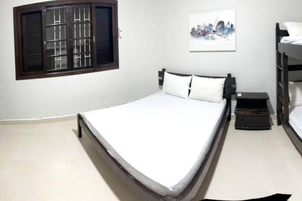 Casa ao lado de duas praias