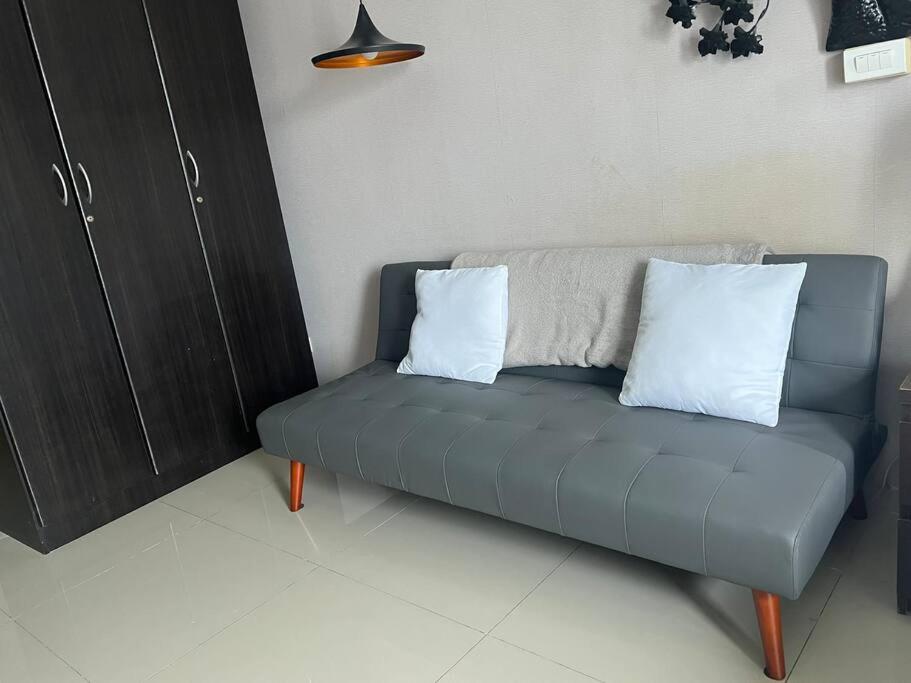 Cozy Makati Condo Getaway with balcony view 5