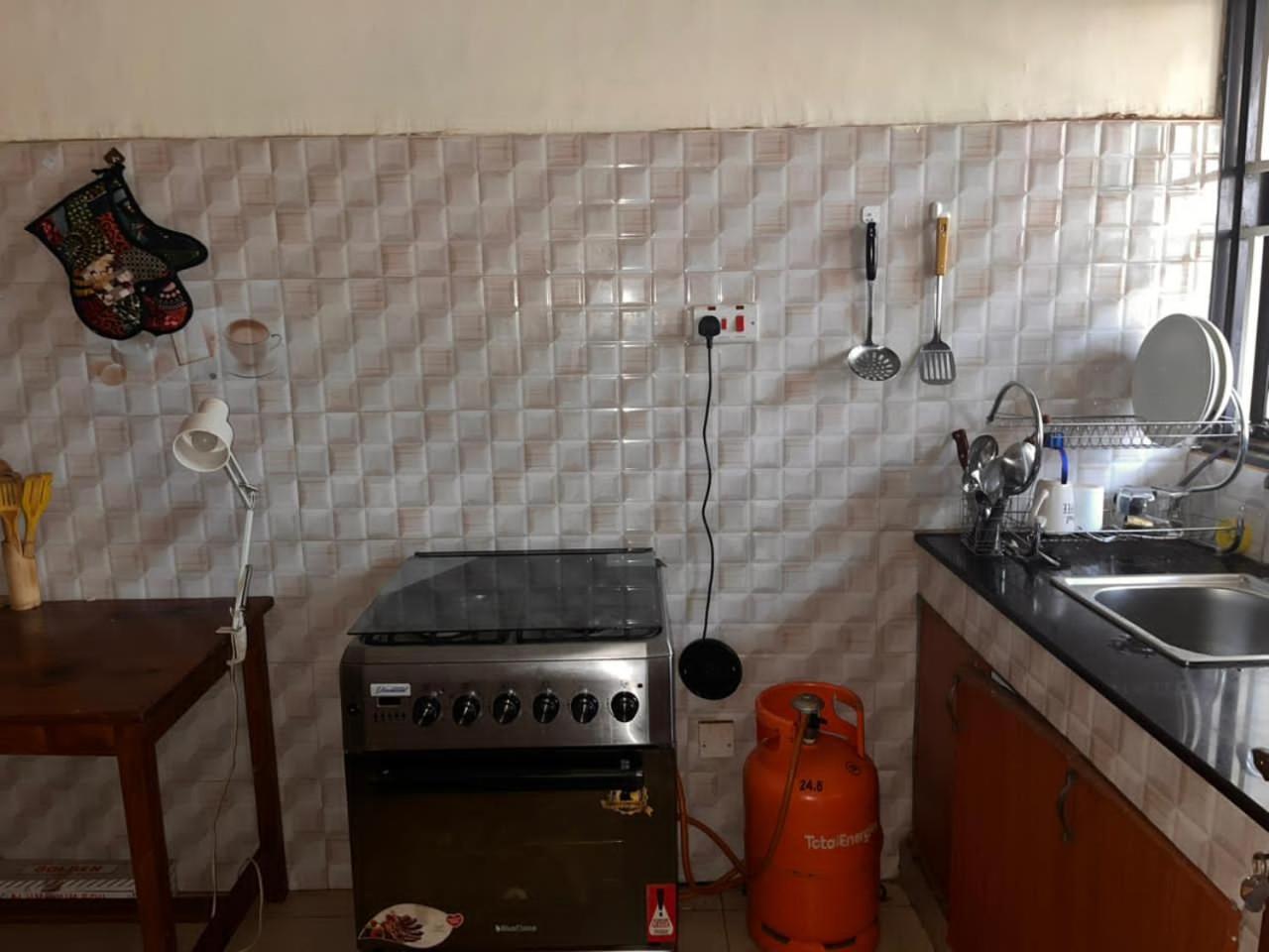Makerere Sojourn w WiFi and free Parking view 2