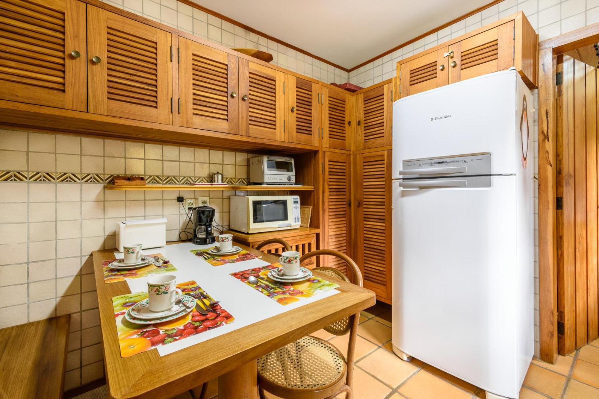 Apartamento com lareira e jardim perto do Capivari