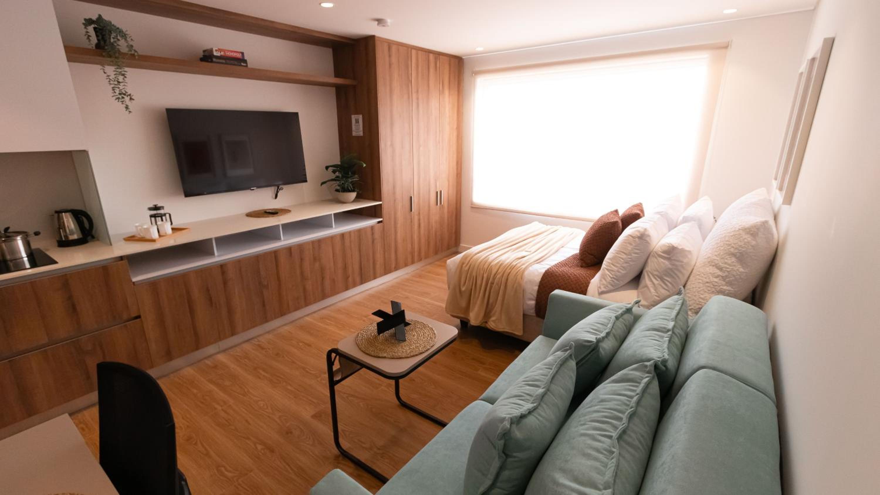 Avanzza apartamentos cerca del Dorado by Wellcome