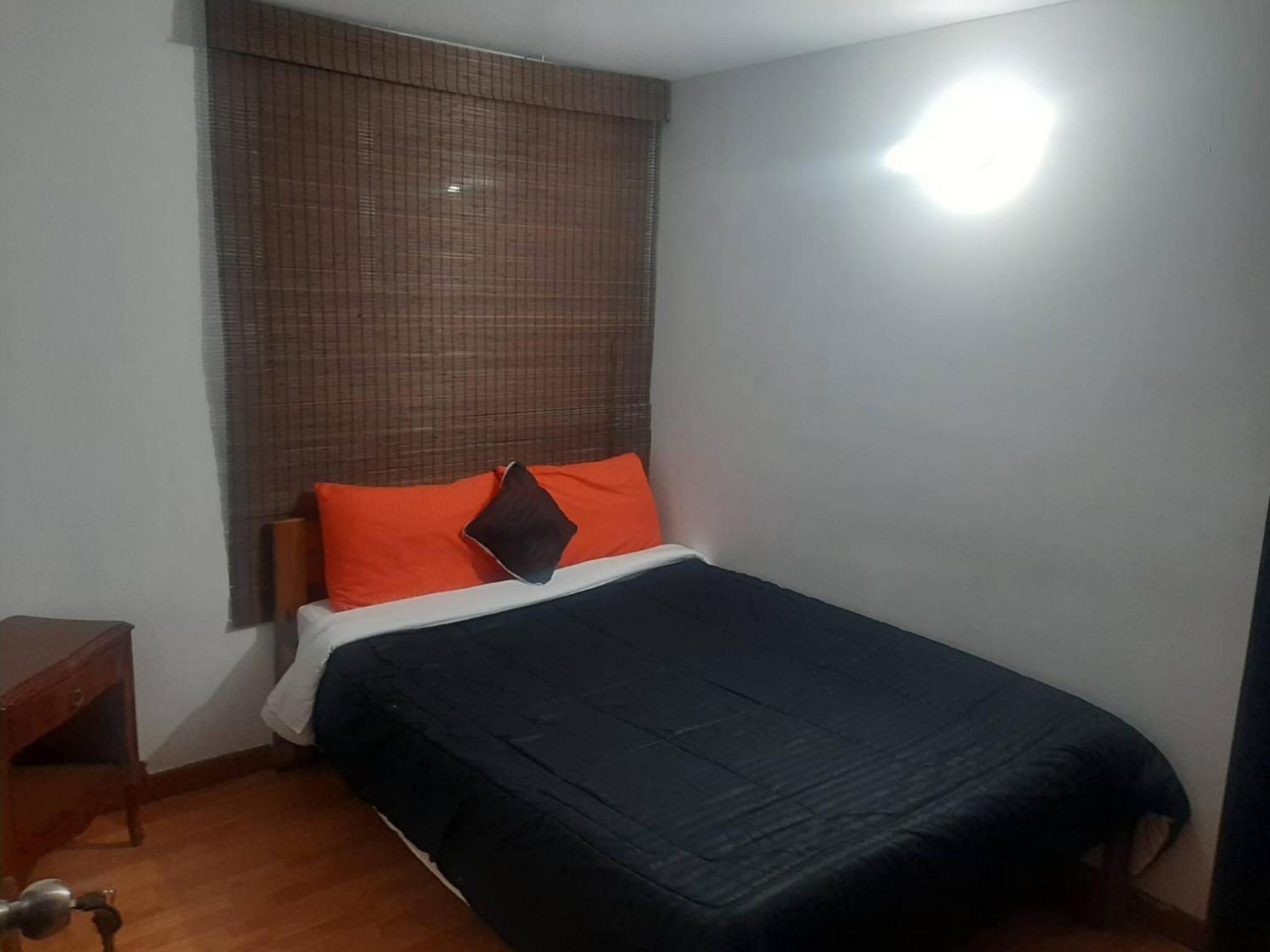 Room in Guest room - Cerca A La Embajada Familiar