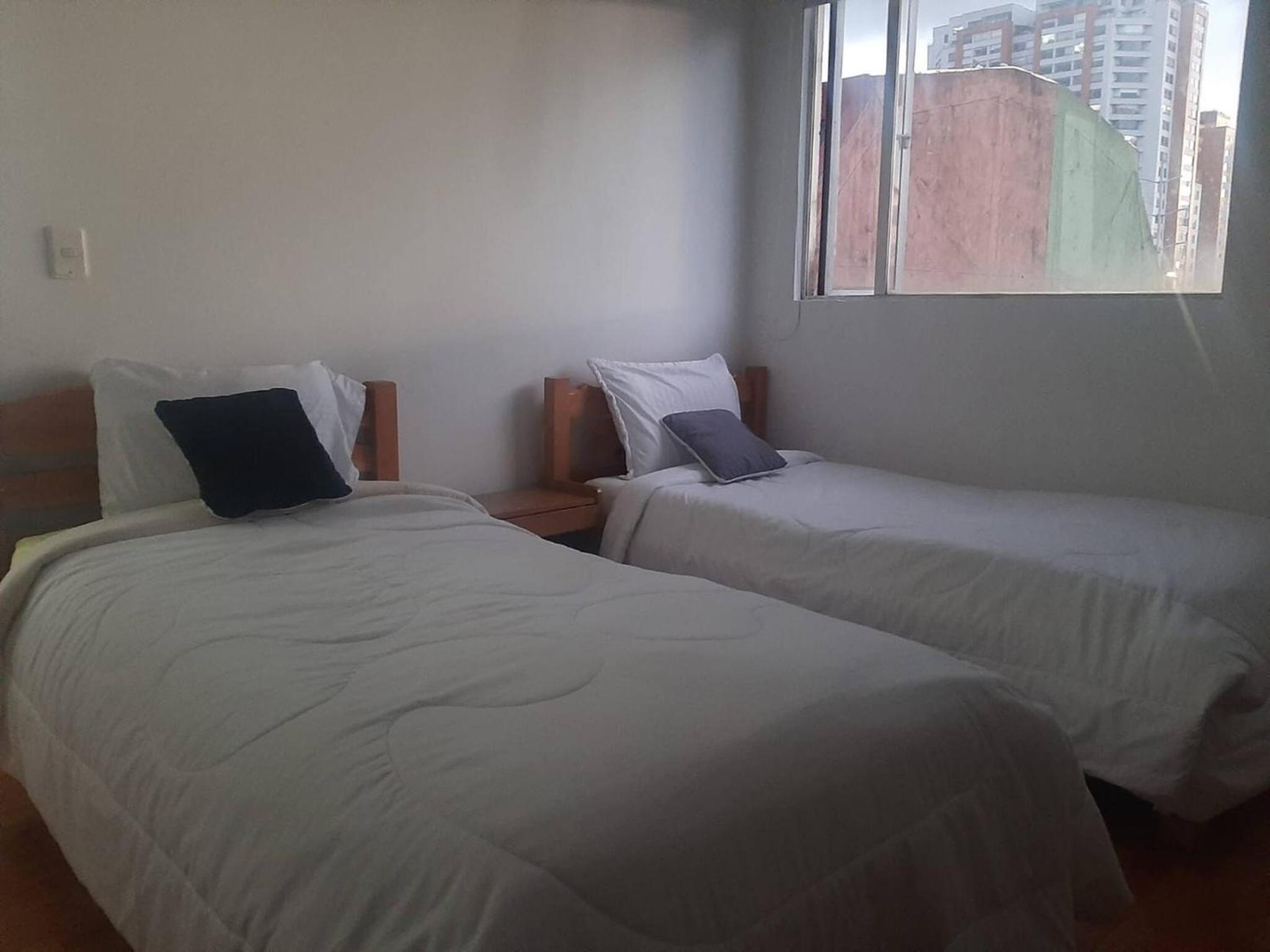 Room in Guest room - Cerca A La Embajada Familiar