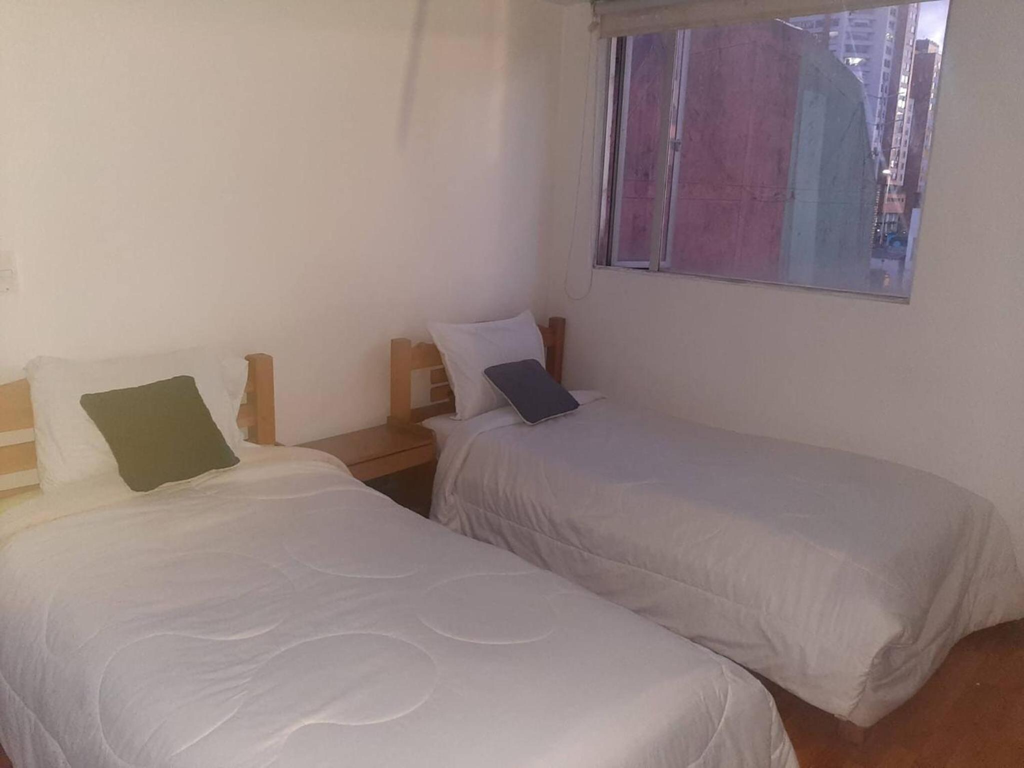 Room in Guest room - Cerca A La Embajada Familiar
