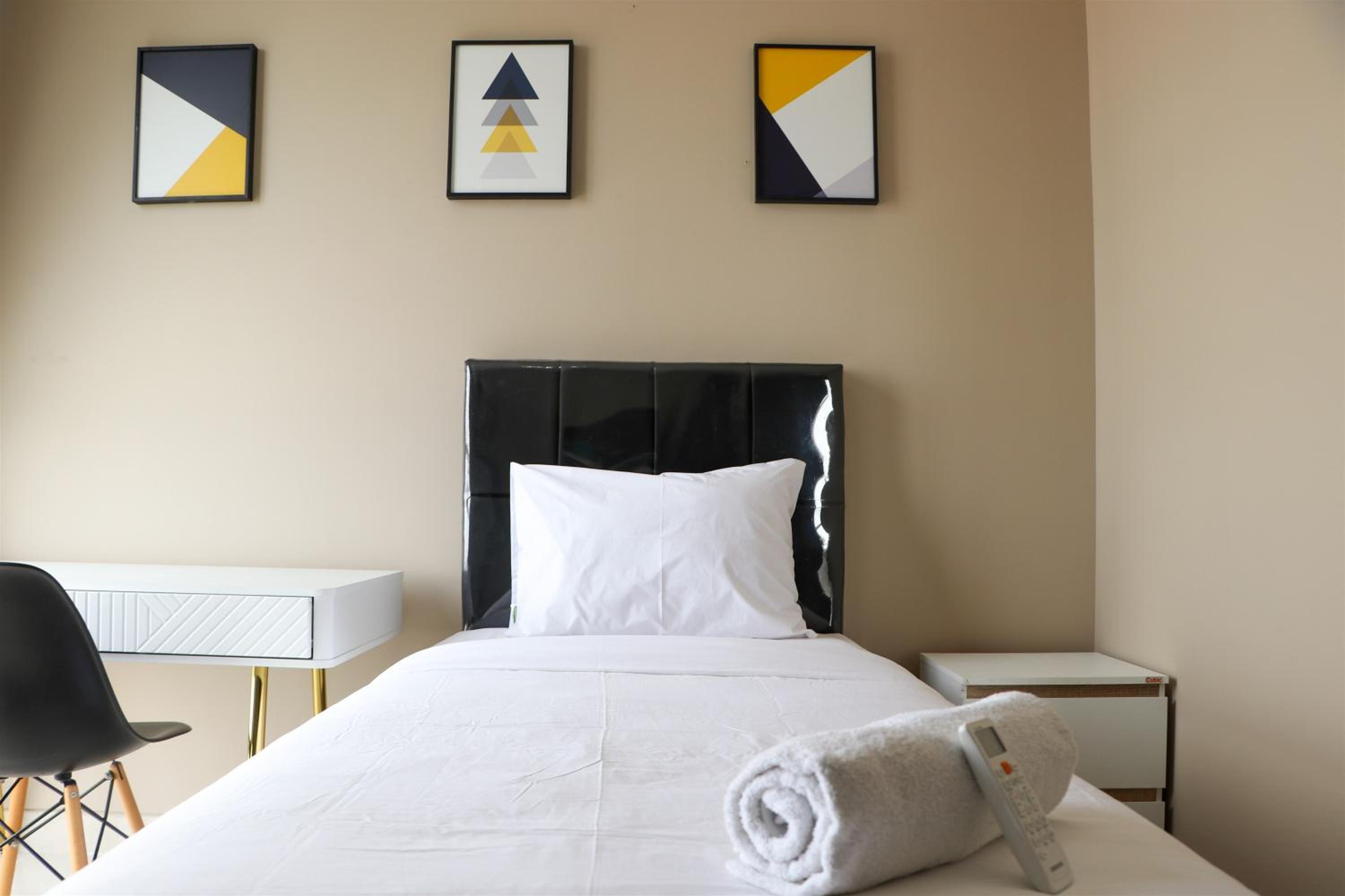 Spacious and Comfy 3BR Ciputra International Apartment By Travelio view 2