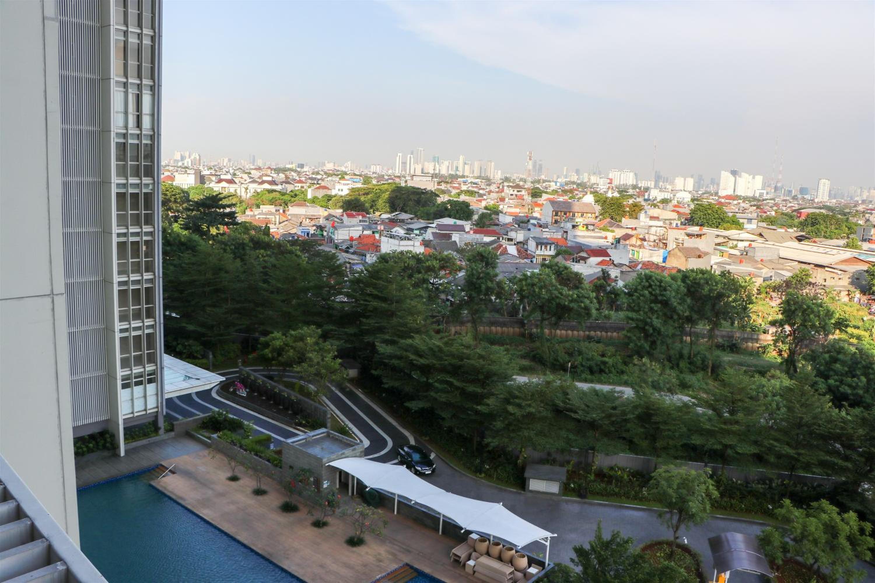 Wonderful and Homey 1BR Ciputra International Apartment By Travelio