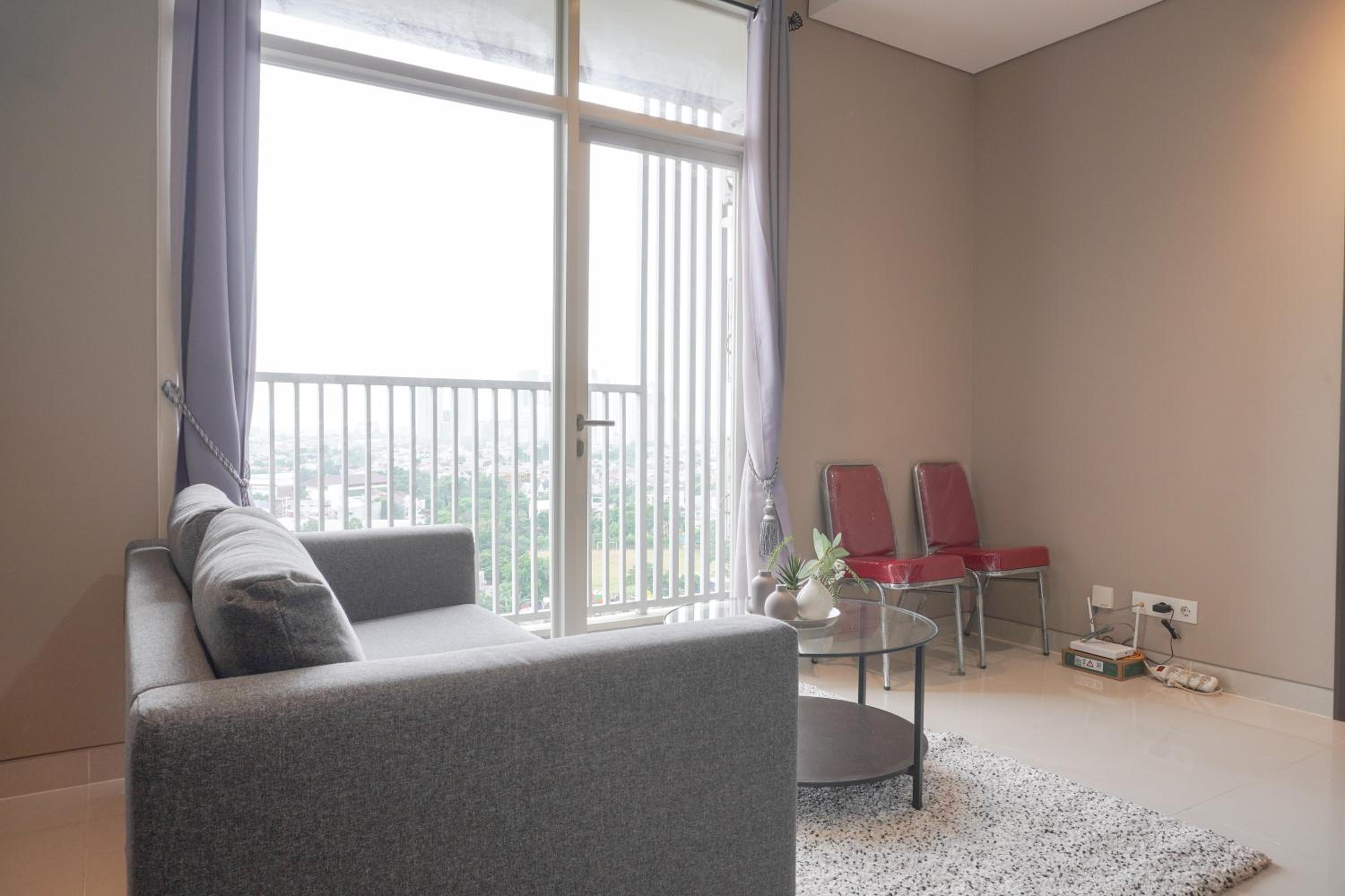 Modern and Comfort Stay 2BR at Ciputra International Apartment By Travelio view 3