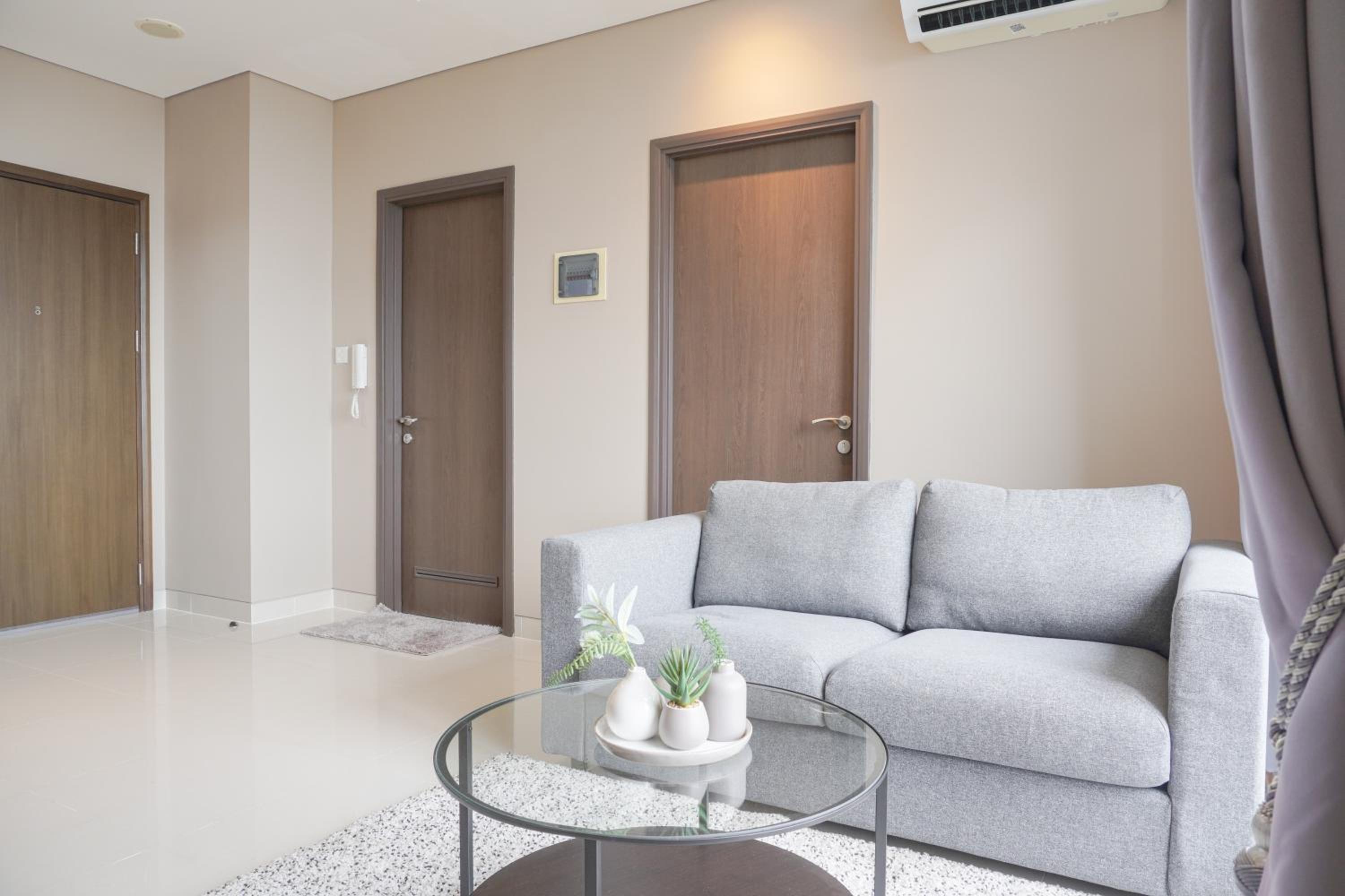 Modern and Comfort Stay 2BR at Ciputra International Apartment By Travelio view 4