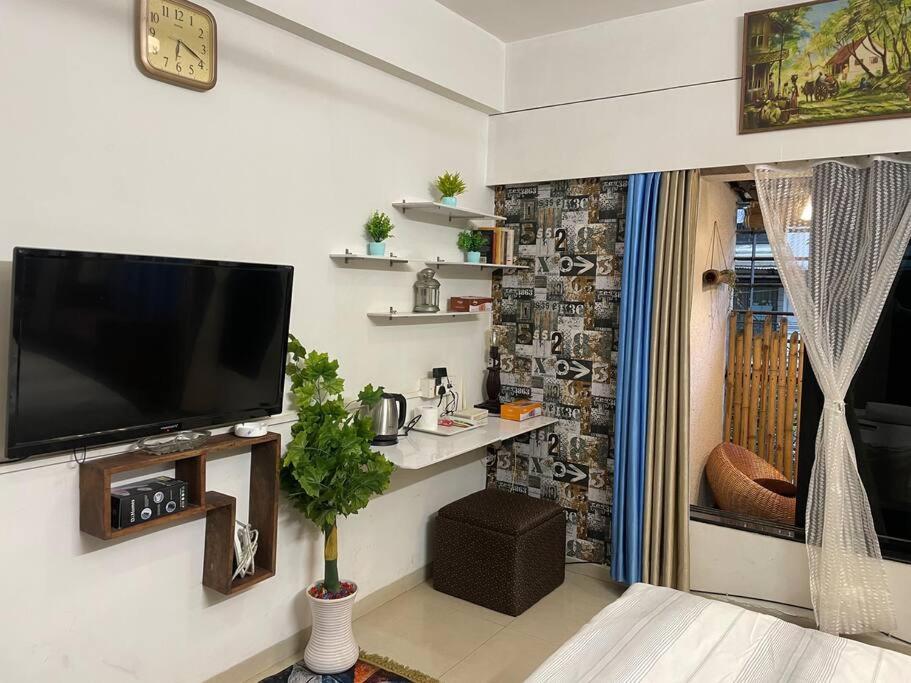 Shubhlaxmi Studio Apartment with sit out - Linking rd view 5
