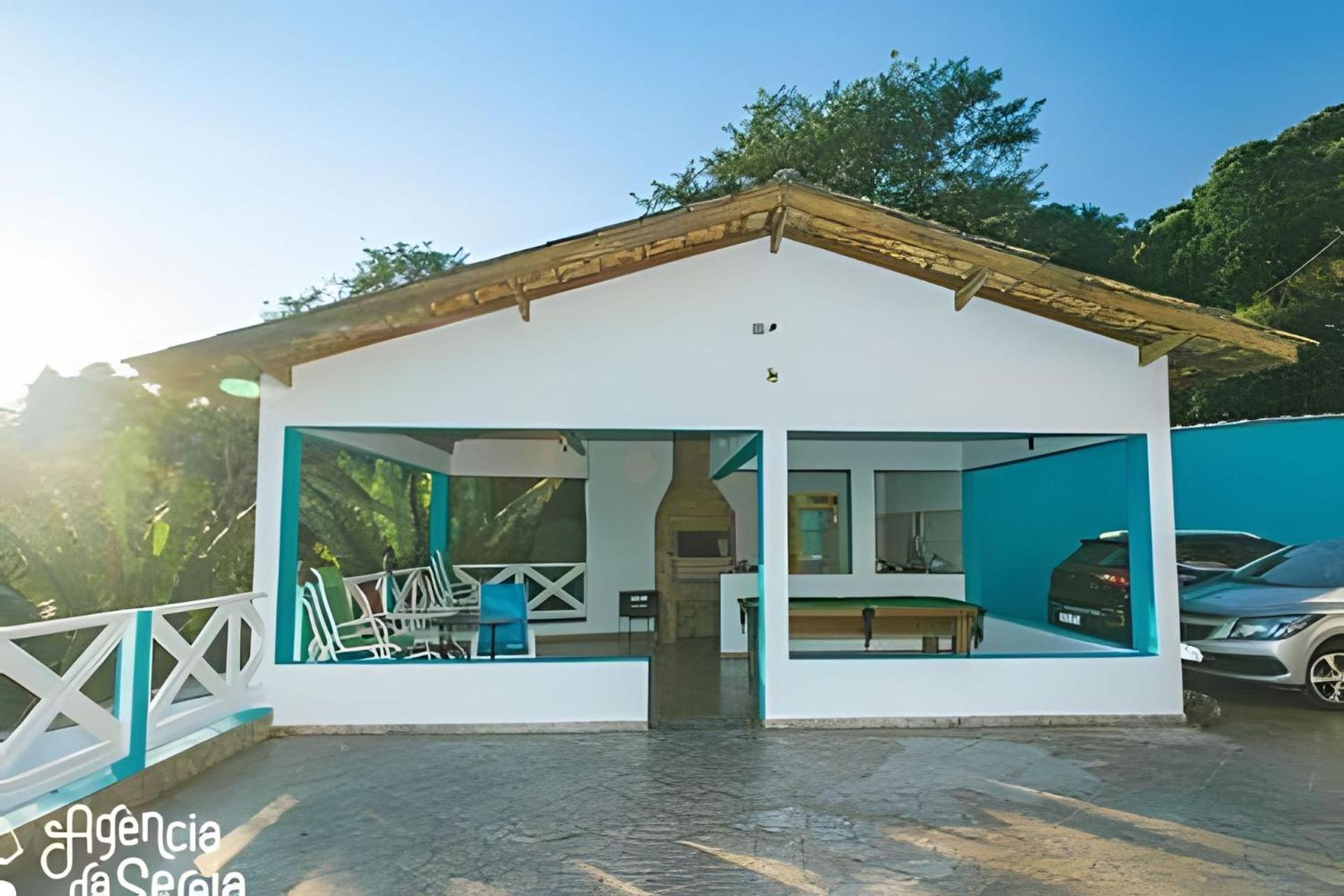 Casa costeira com vista e área gourmet no Borrifos