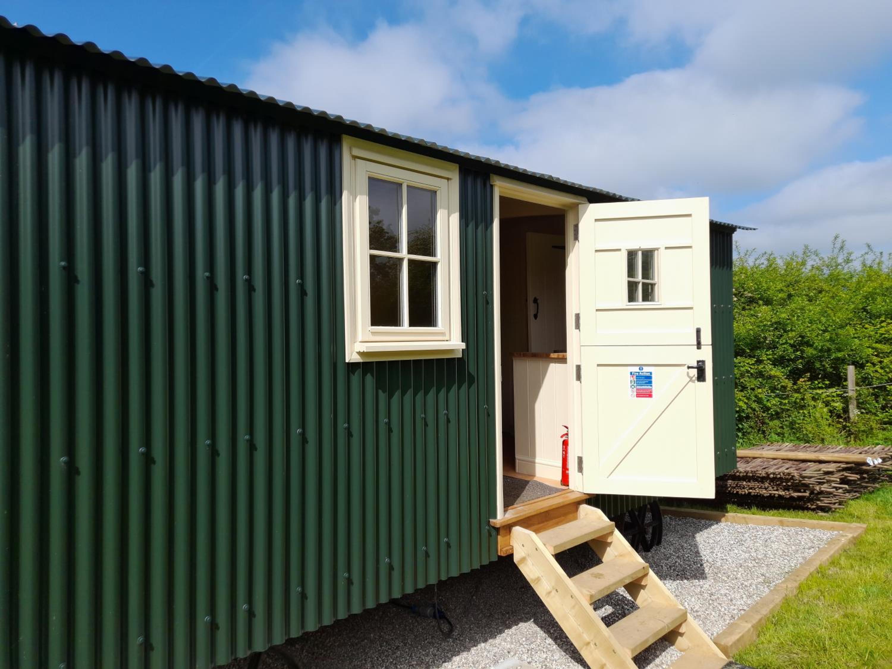 Hill Top Hideaway Shepherds Hut with Hot Tub