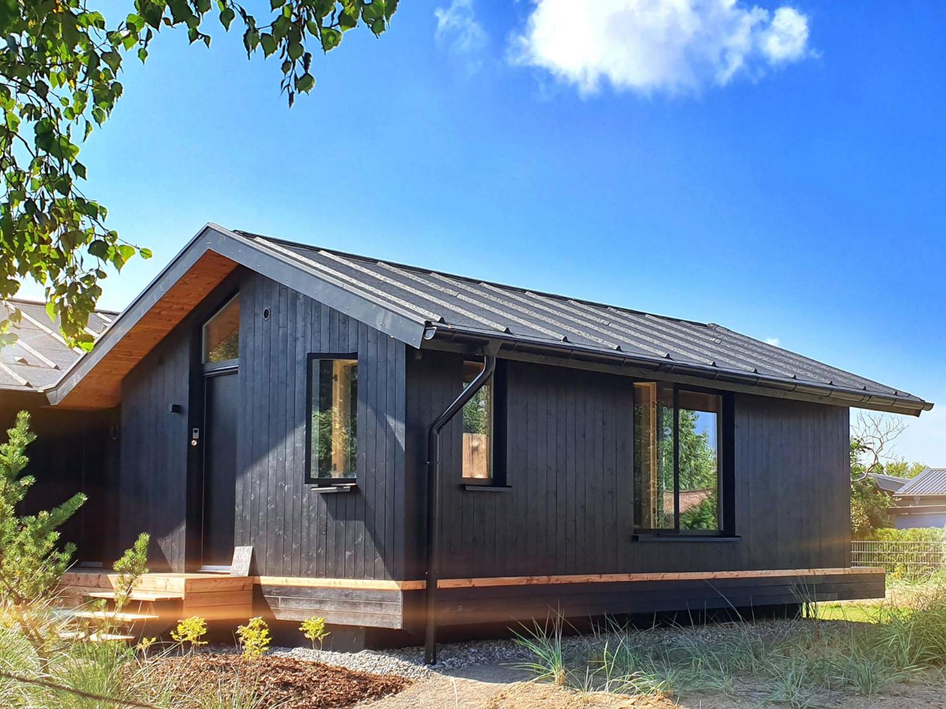 Werder Chalet -- COZYKOJE -- Ostsee Strand 150m I Sauna I eKamin I Tiny House mit Meerblick I 2 Pers und Kind I by 