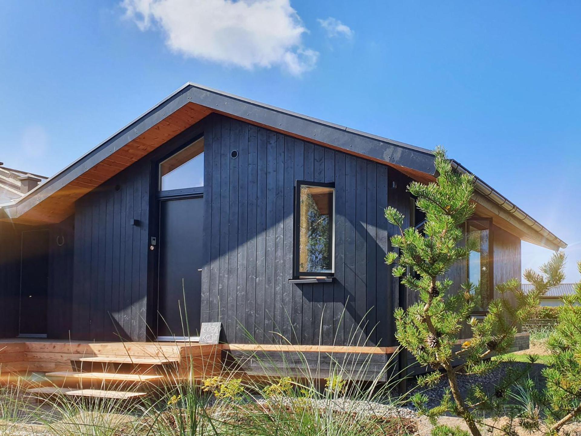 Werder Chalet -- COZYKOJE -- Ostsee Strand 150m I Sauna I eKamin I Tiny House mit Meerblick I 2 Pers und Kind I by 