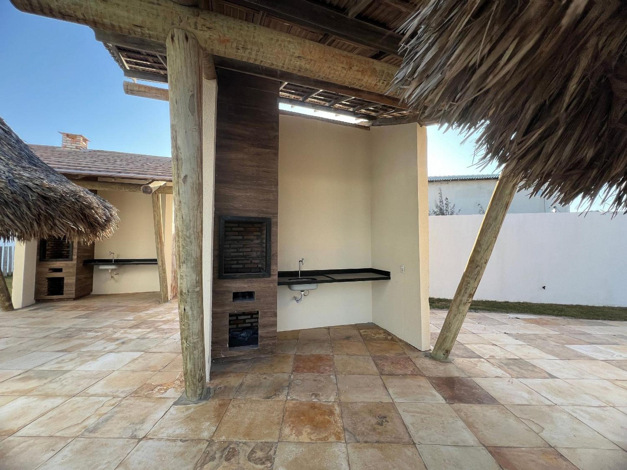 Casa de luxo em condomínio pé na areia com 4 suítes, roftoop com jacuzzi e vista para o mar
