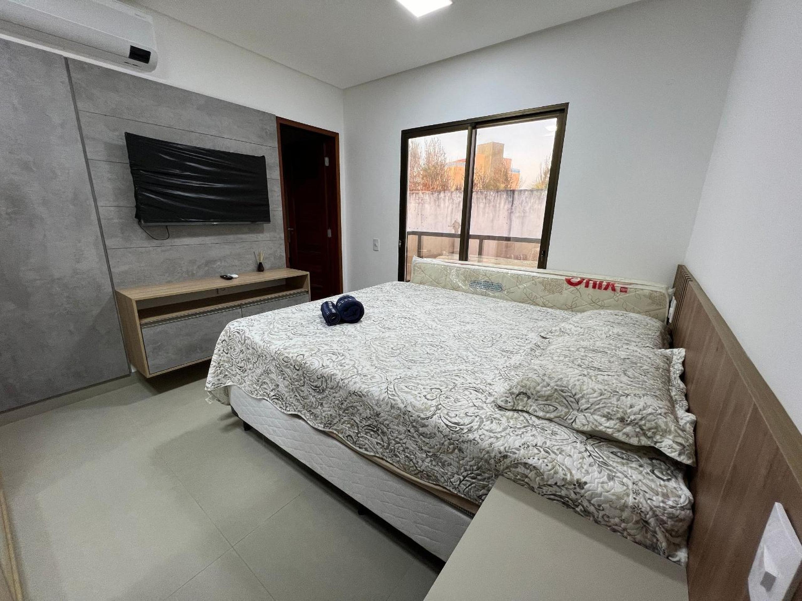 Casa de luxo em condomínio pé na areia com 4 suítes, roftoop com jacuzzi e vista para o mar