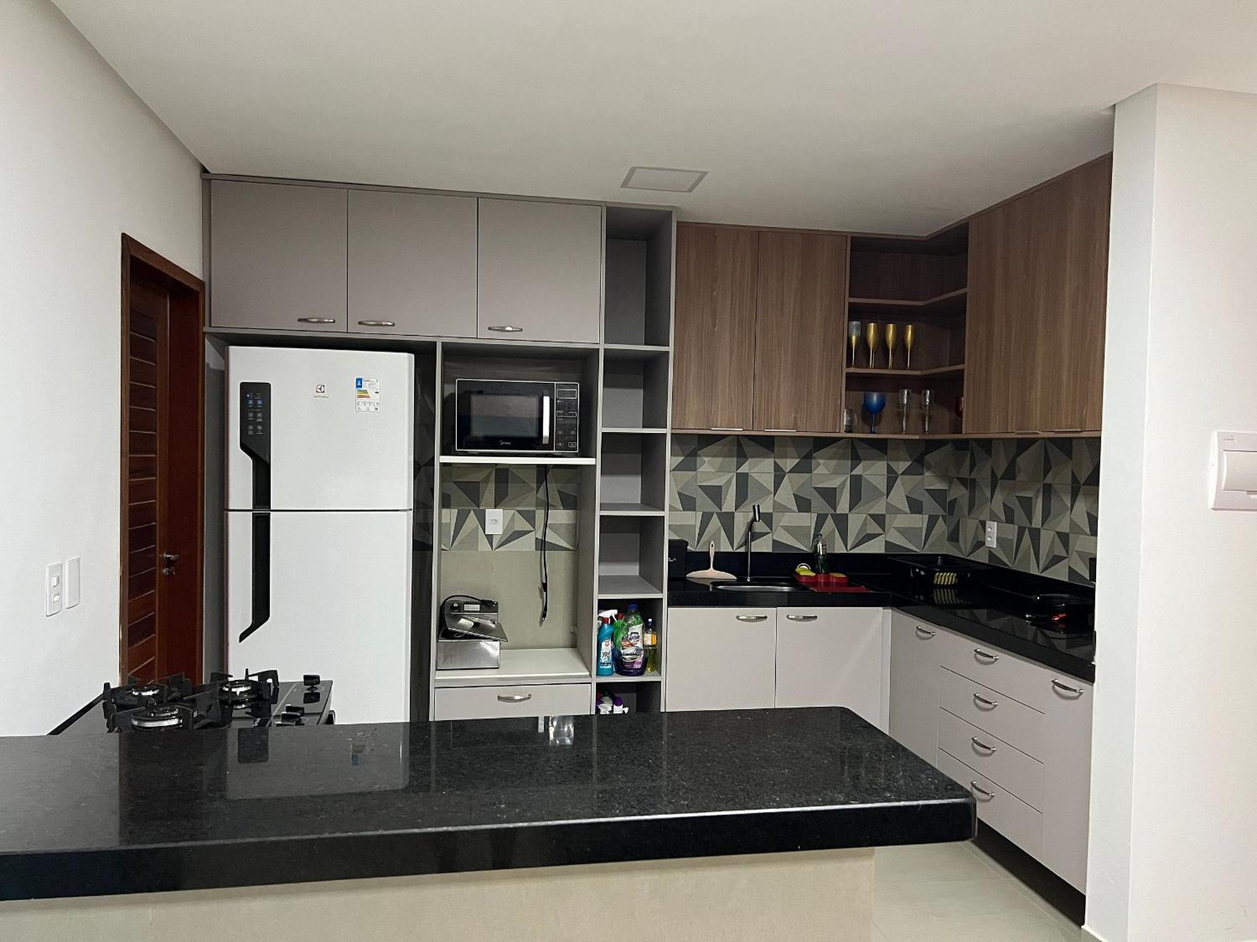Casa de luxo em condomínio pé na areia com 4 suítes, roftoop com jacuzzi e vista para o mar