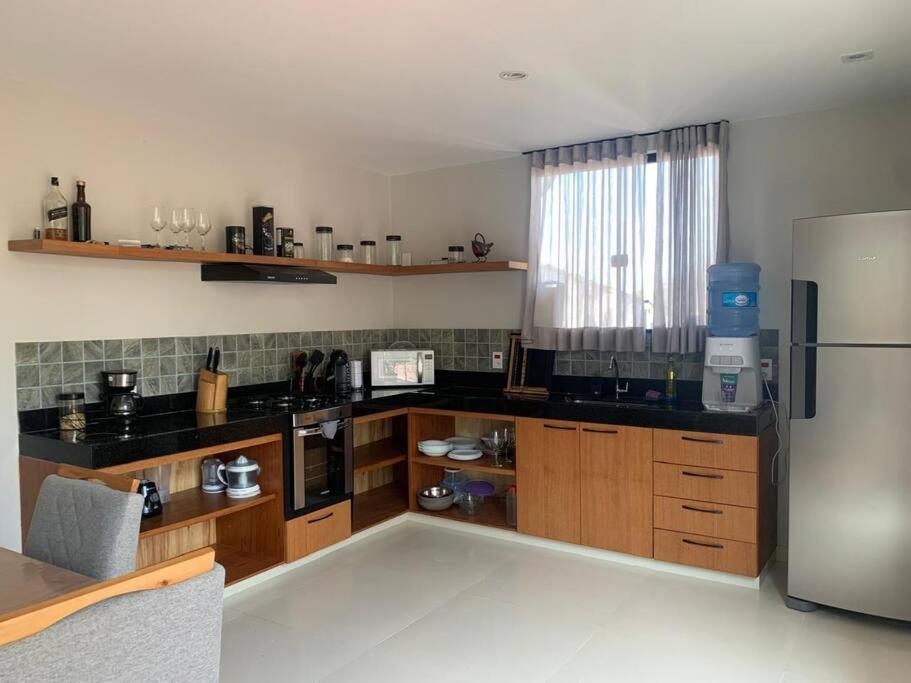 Casa vista mar com piscina e perto das praias e centro