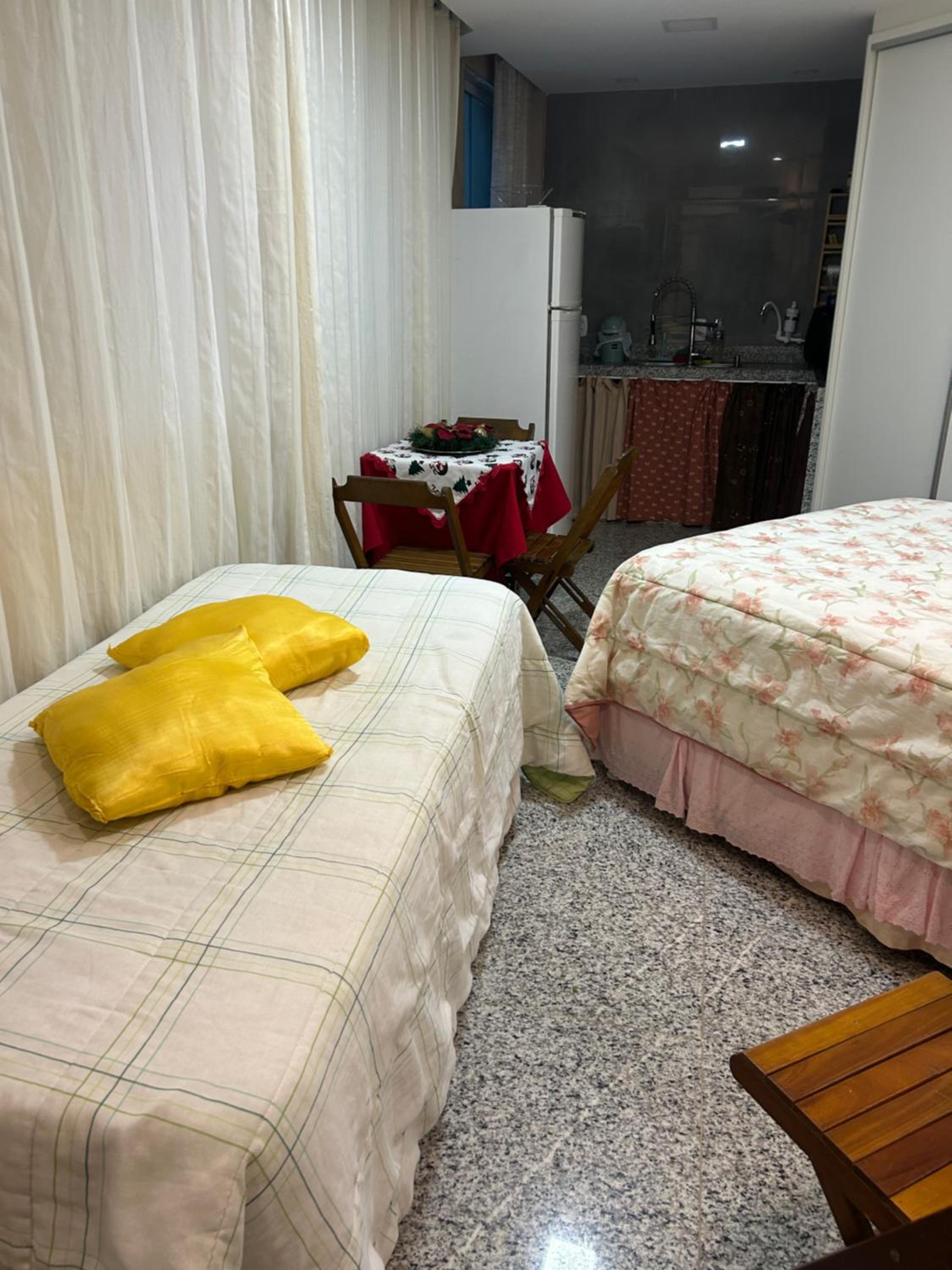 Studio pés na areia