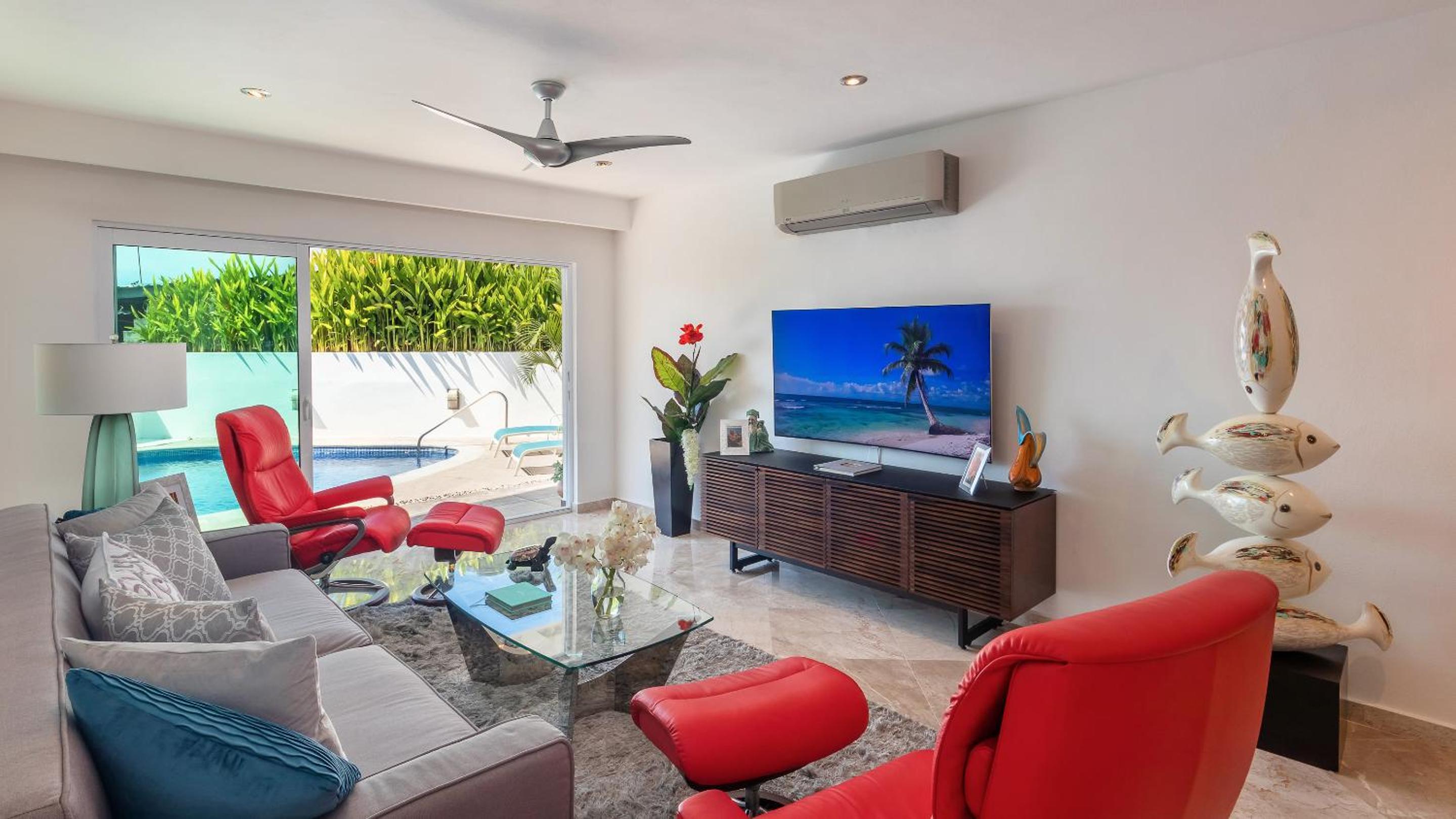 Stylish Poolside Condo with Sea Views Apple TV view 4