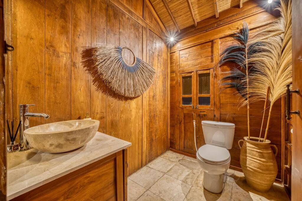 Charming 4BR Wooden Villa with Lush Garden Oasis by Santi mnagement