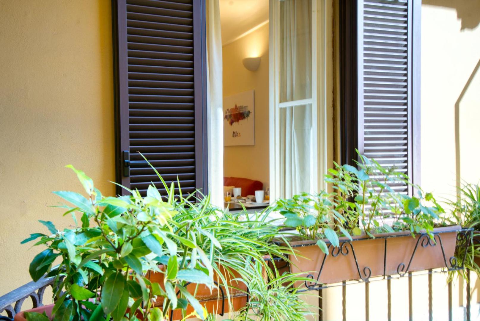 GuestHost - DeAngeli Nest romantico bilocale di design in zona De Angeli, rinnovato e accessoriato