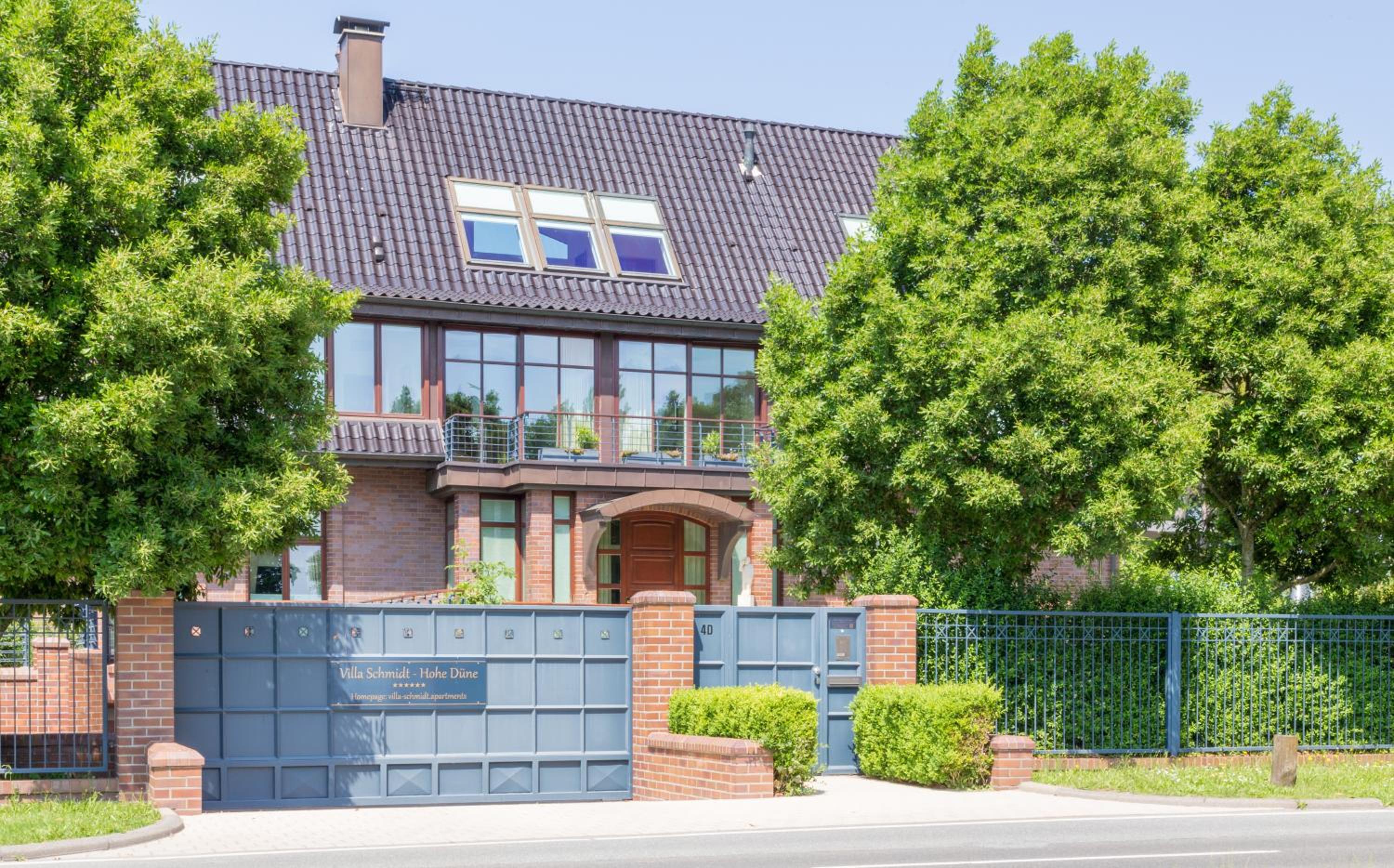 Villa Schmidt Apartments - Strandhaus direkt am Meer mit Sauna, Sport und Dünengarten - Komfort