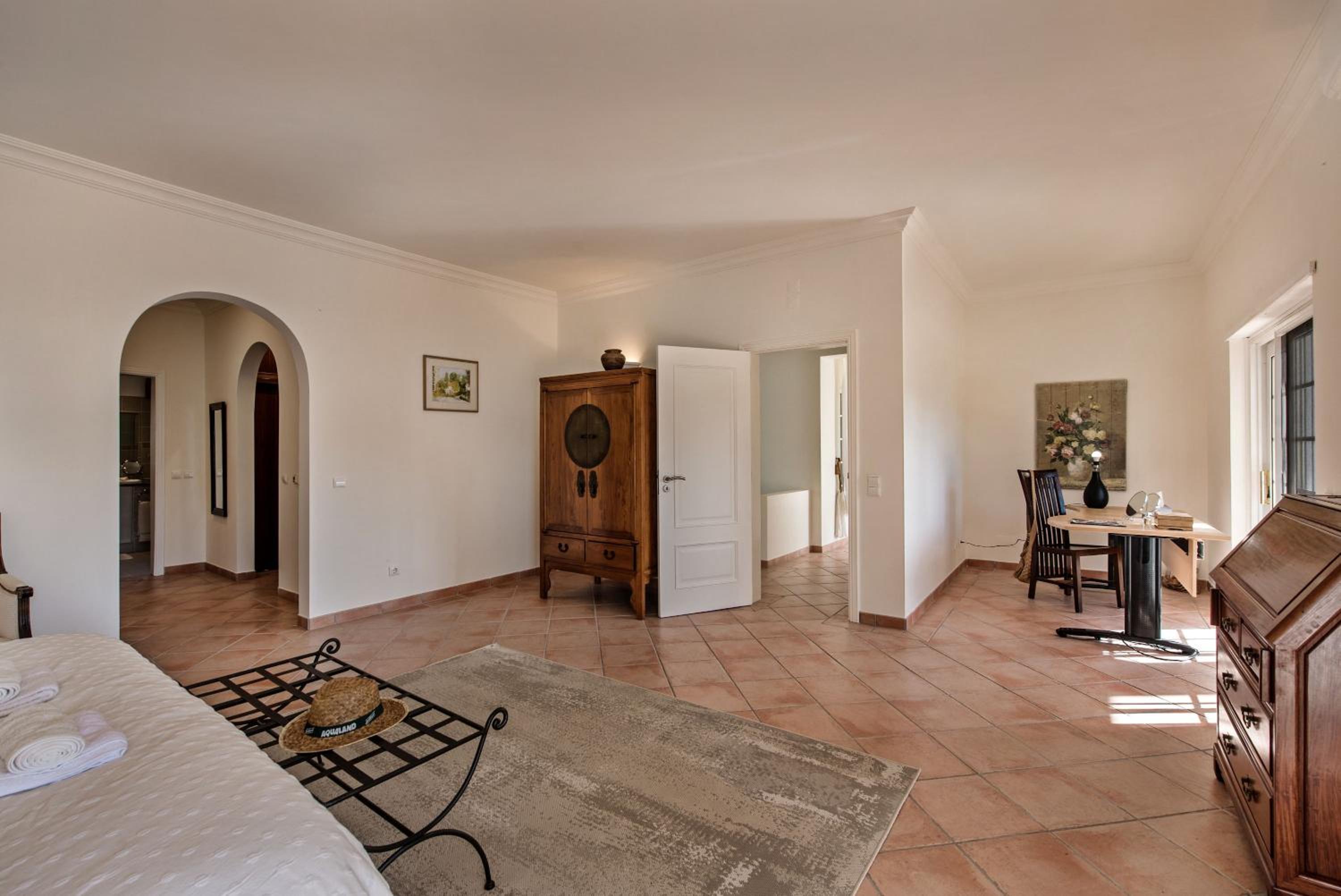 Almancil Vacations - Dazzling Almancil Villa  Villa Magorian  4 Bedrooms  Spacious Furnished Sun Terrace  Private Outdoor Pool  BBQ Facilities  Shaded Outdoor Dining Area  Private Garden  Quinta Do Lago - Property Image 6