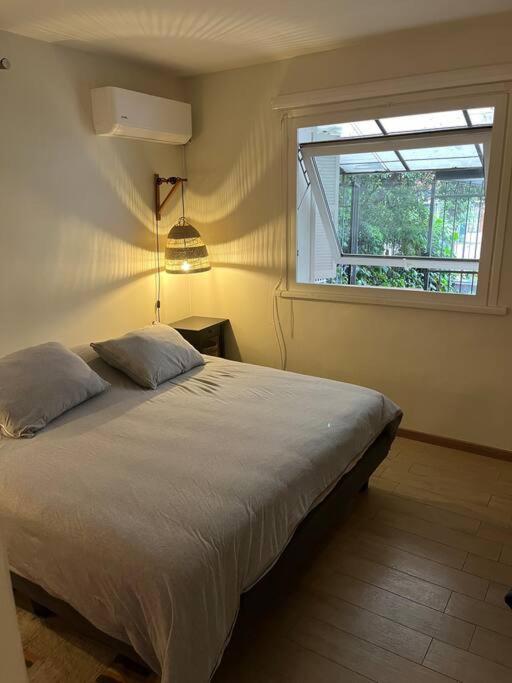 Departamento con patio privado junto al Costanera