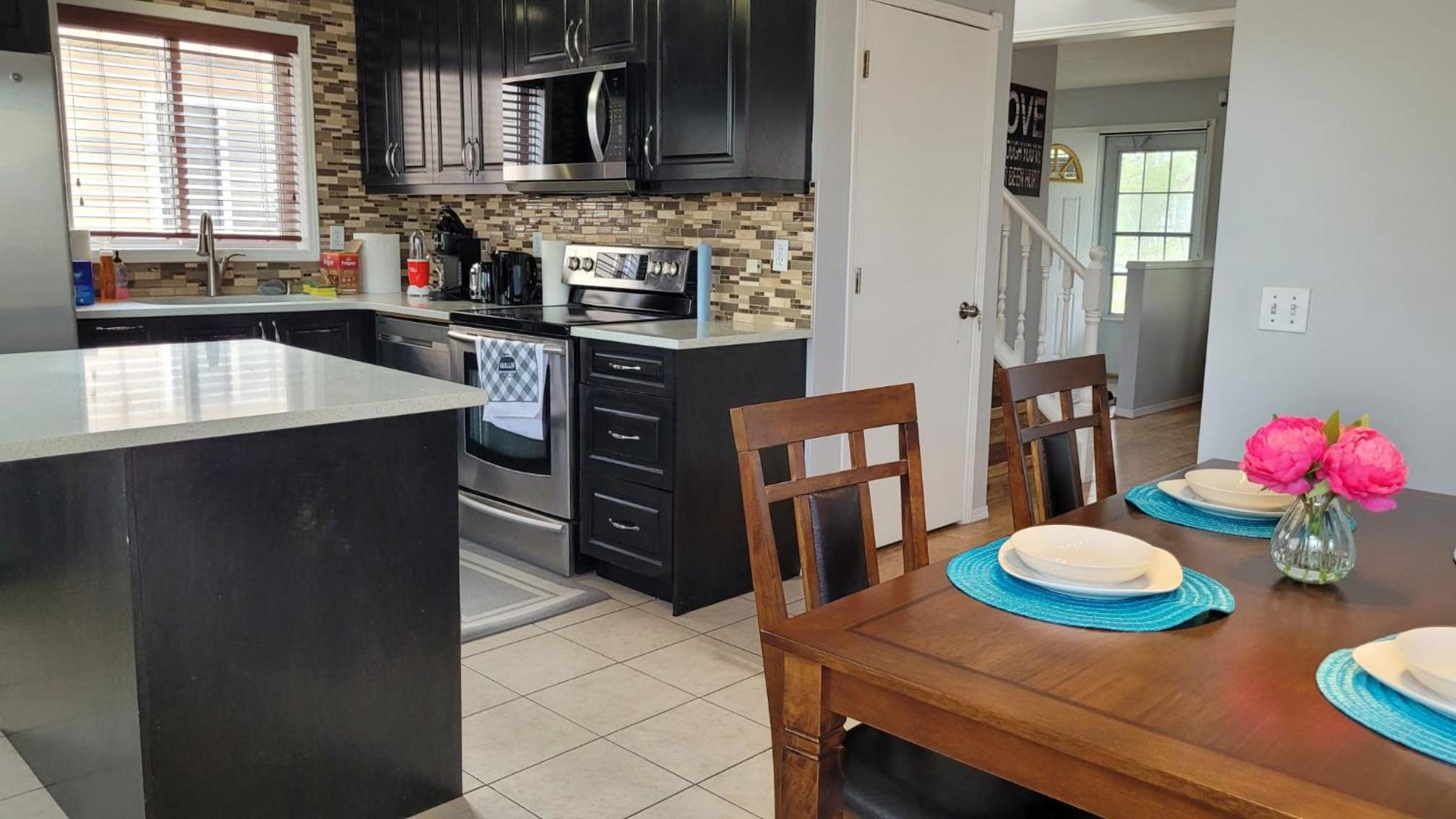 Upper level- Elegant 4-Bedroom Family Home 1