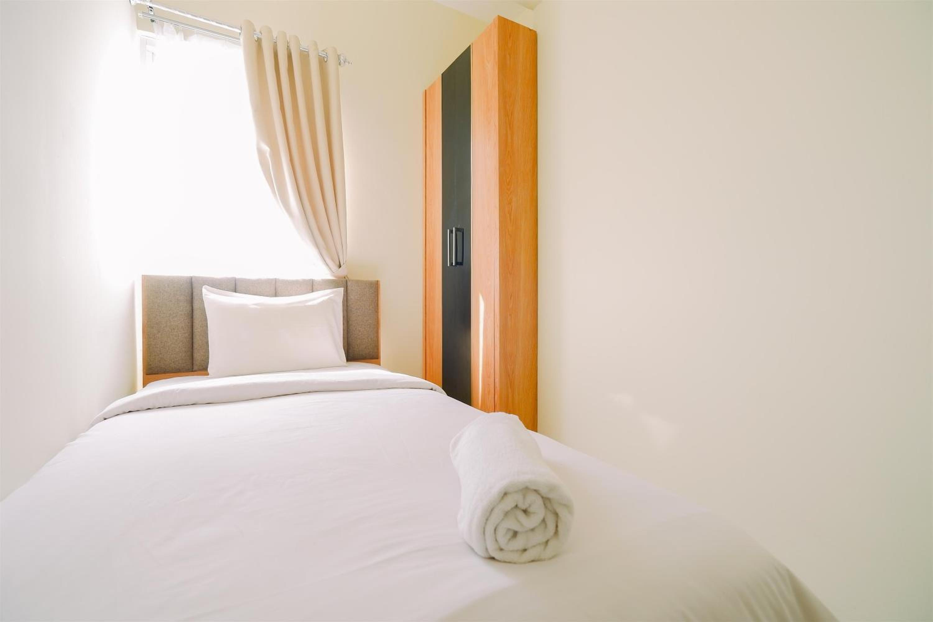 Warm and Cozy Living 2BR Bogorienze Apartment By Travelio