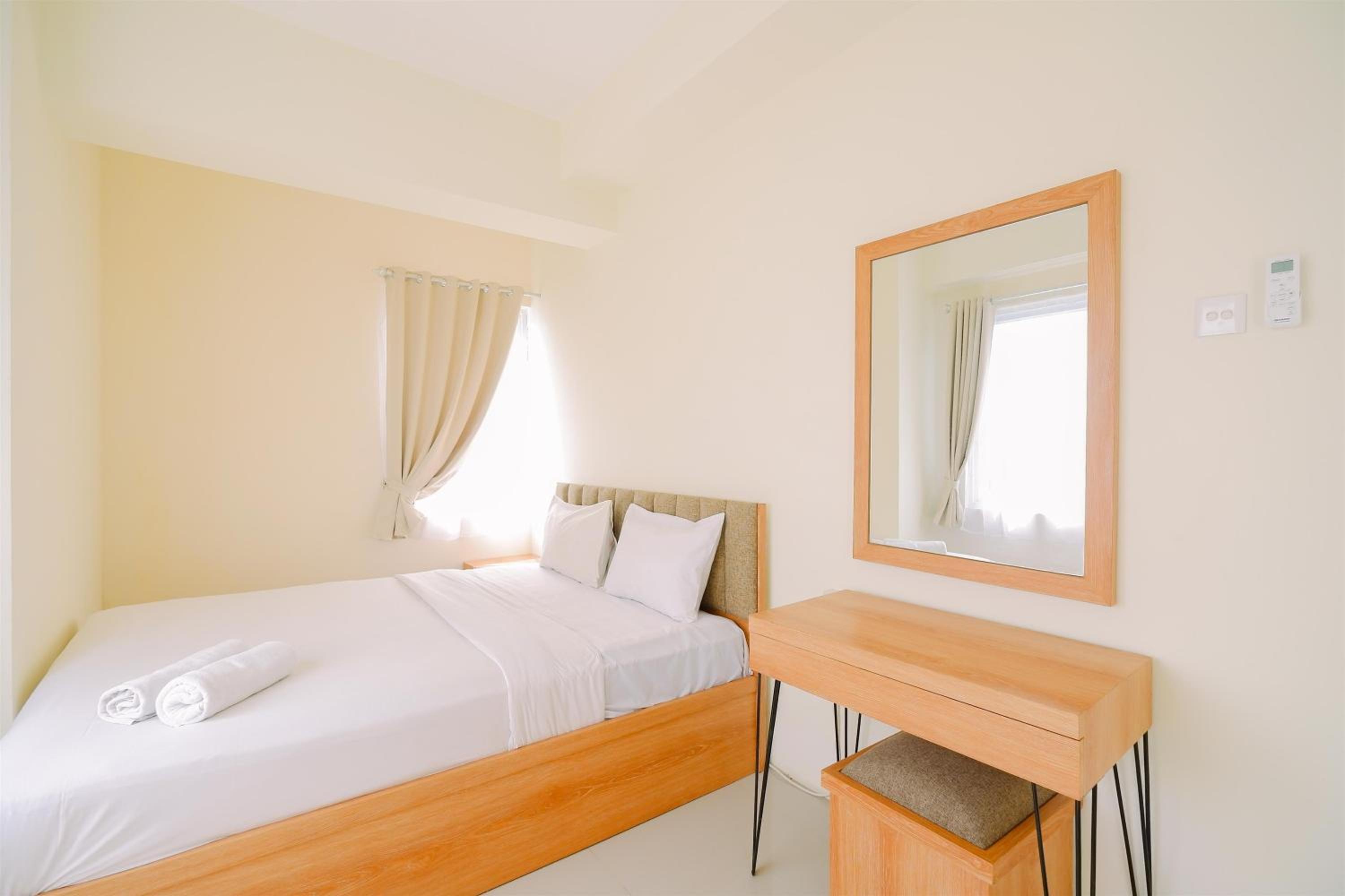 Warm and Cozy Living 2BR Bogorienze Apartment By Travelio