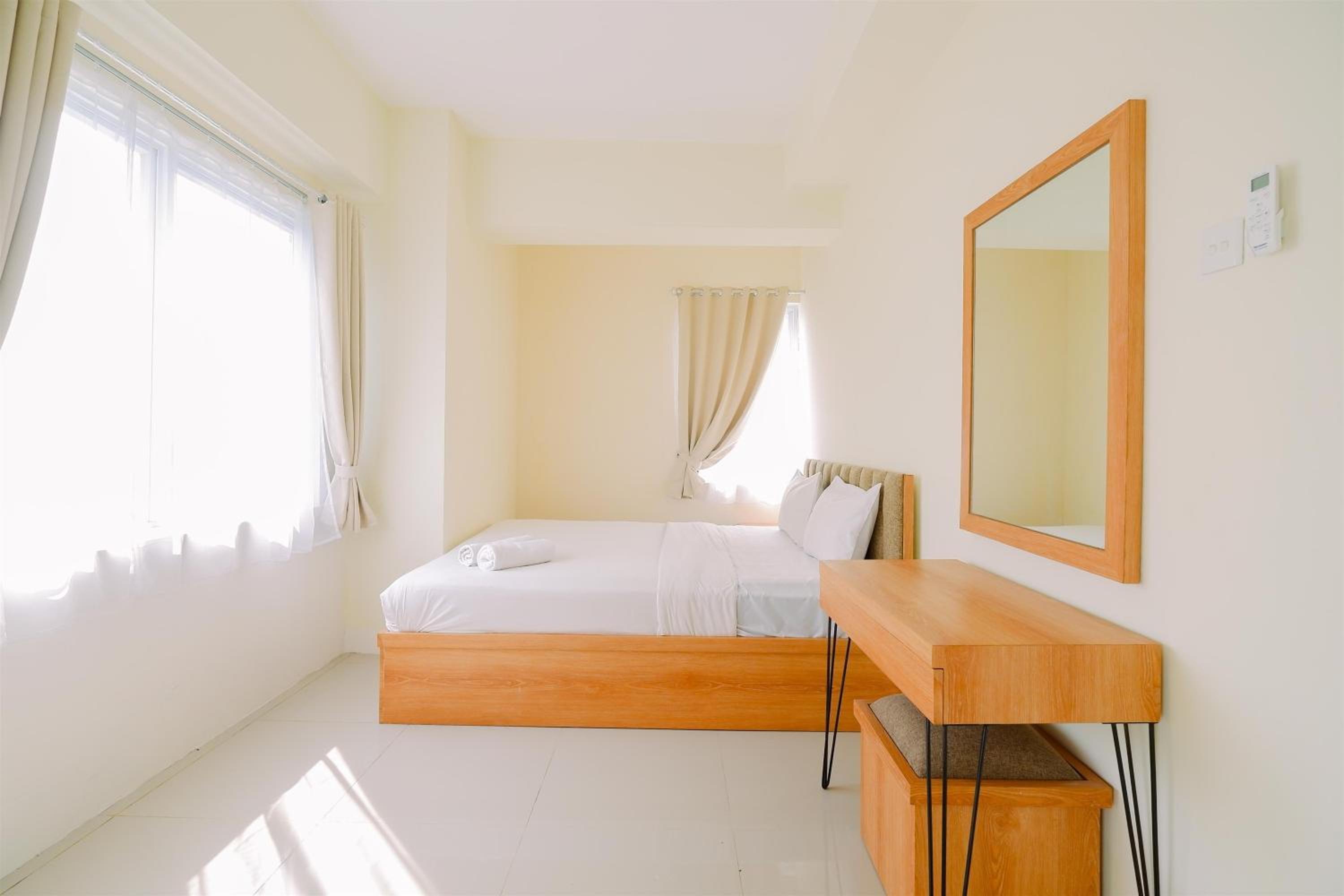 Warm and Cozy Living 2BR Bogorienze Apartment By Travelio