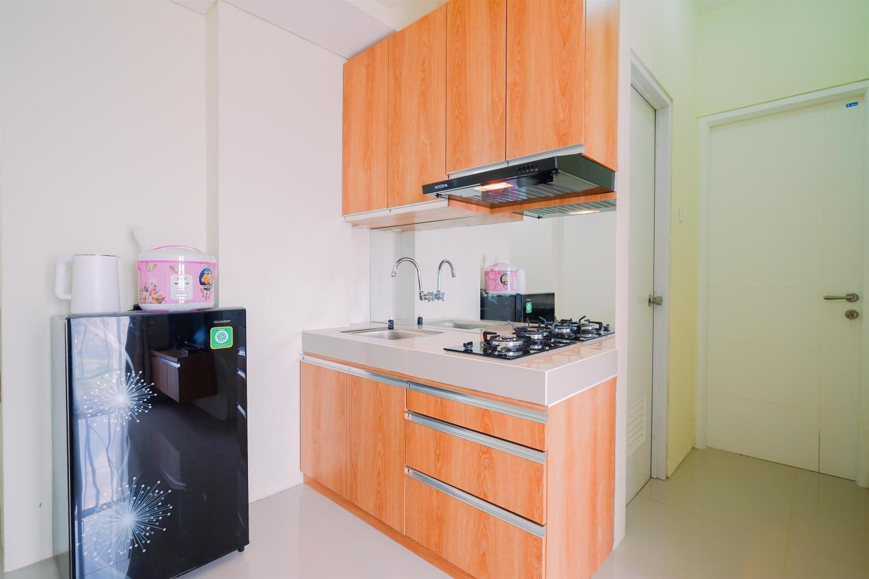 Warm and Cozy Living 2BR Bogorienze Apartment By Travelio