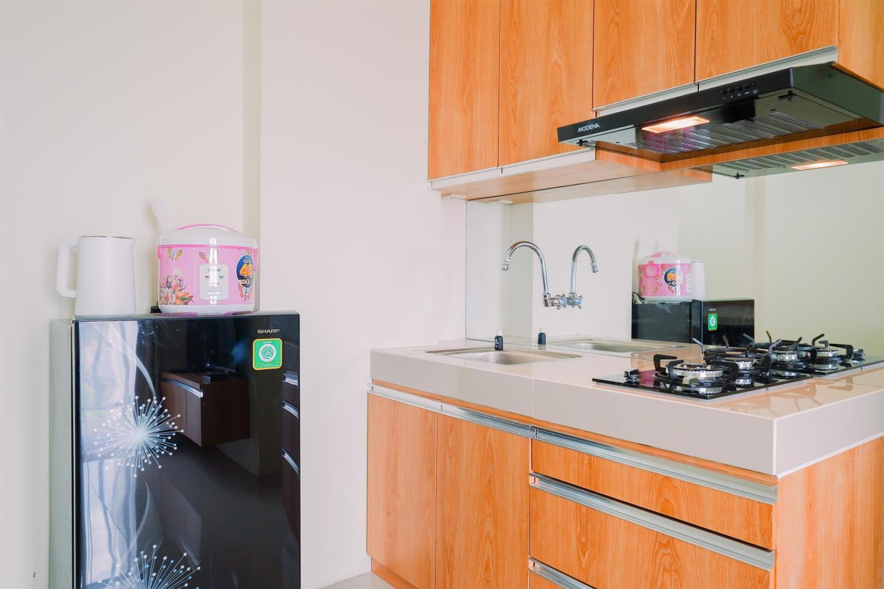 Warm and Cozy Living 2BR Bogorienze Apartment By Travelio